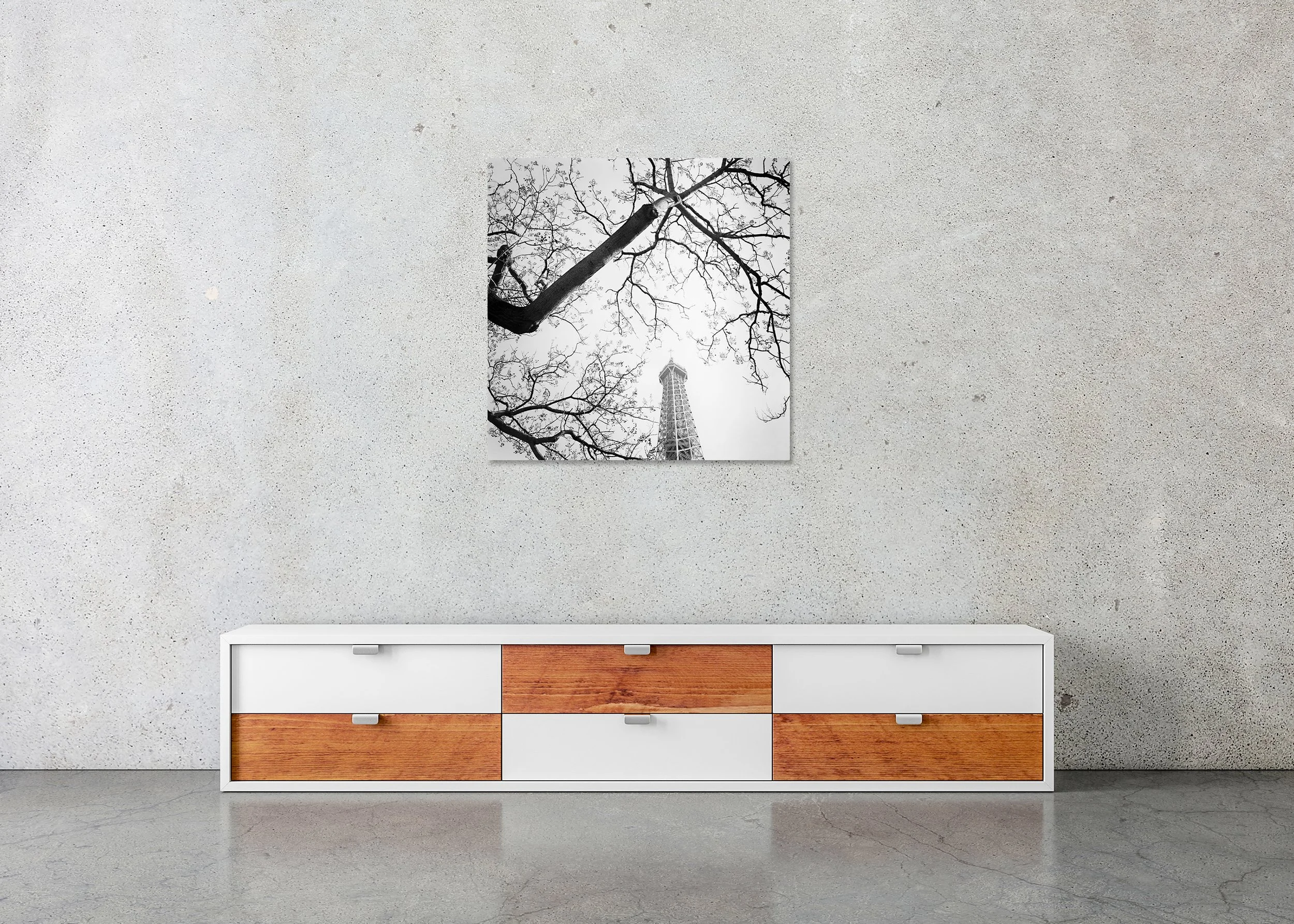Tree and the Eiffel Tower by Gerald Berghammer displayed as frameless Dibond in a contemporary interior