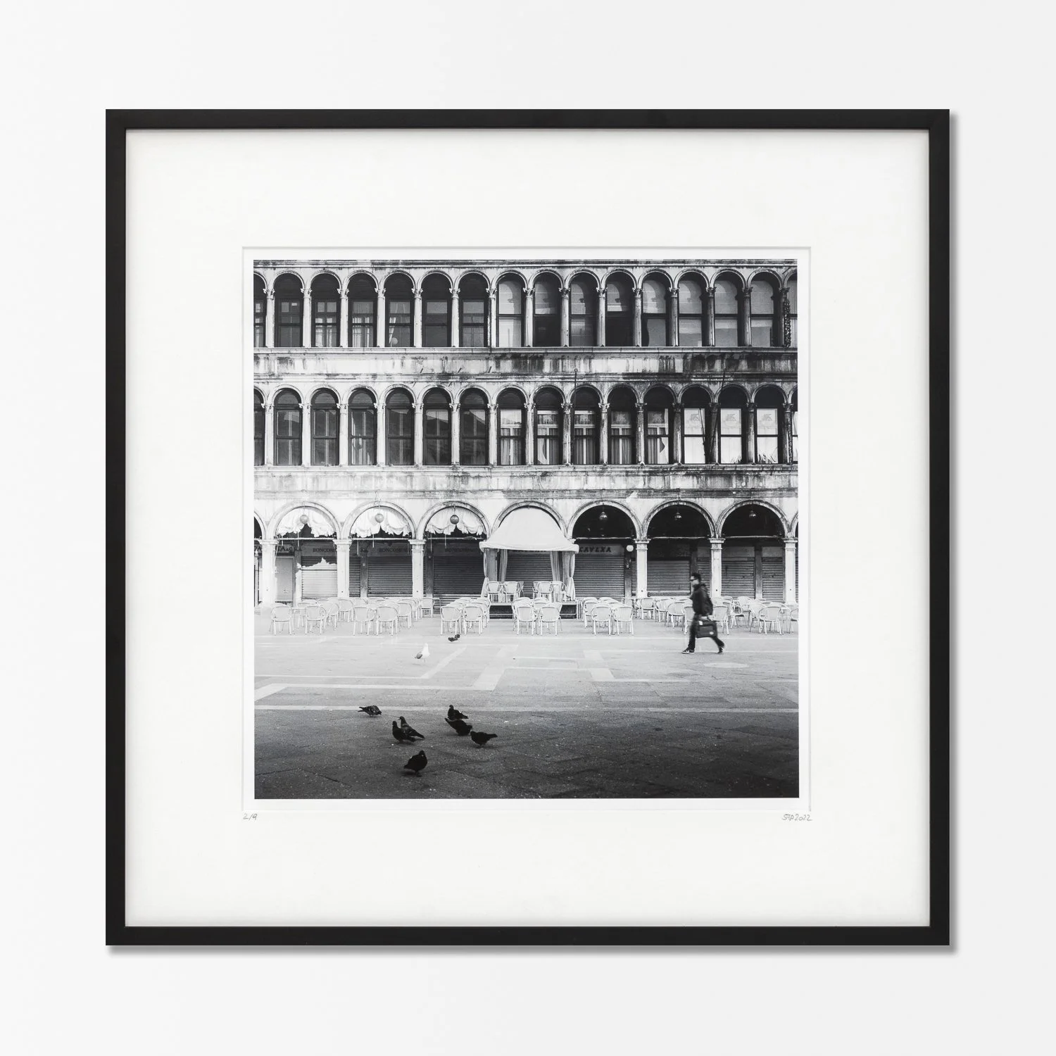 Framed Caffè Florian black-and-white photograph by Gerald Berghammer, with a black wooden frame and natural-white archival mount.