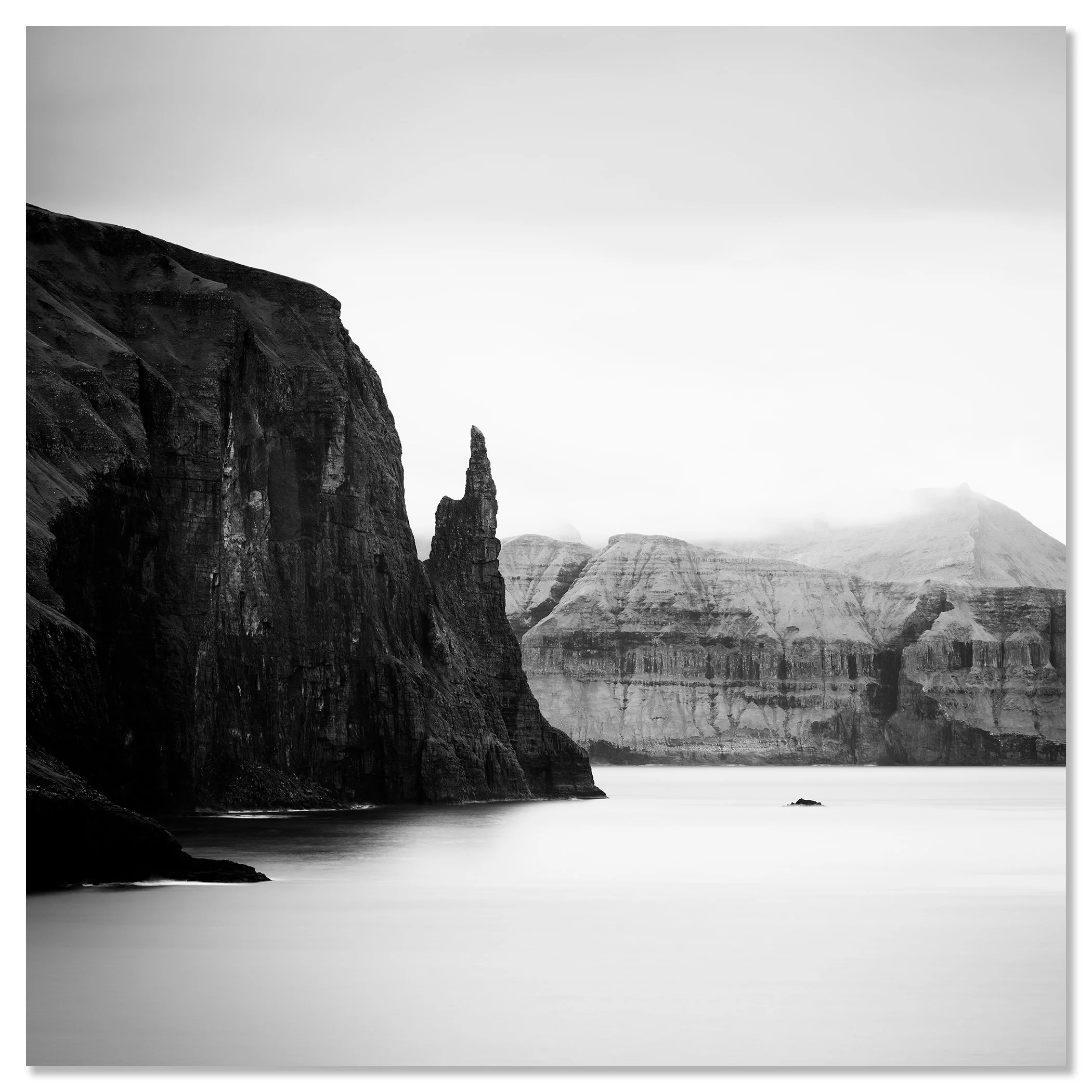 Trøllkonufingur Monolith Study 2, Faroe Islands, shown as a frameless black-and-white artwork mounted on aluminium Dibond by Gerald Berghammer.