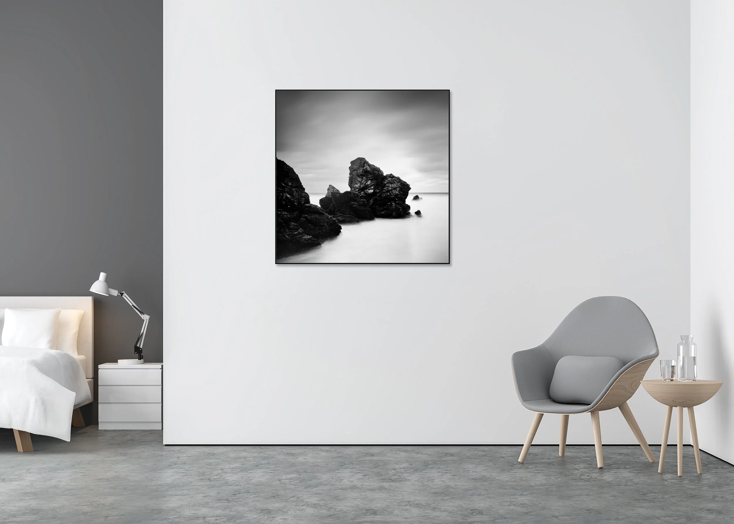 Award-Winning Beach Study 4 – black-and-white photograph in a black aluminium ArtBox displayed in a minimalist bedroom. Photo by Gerald Berghammer.