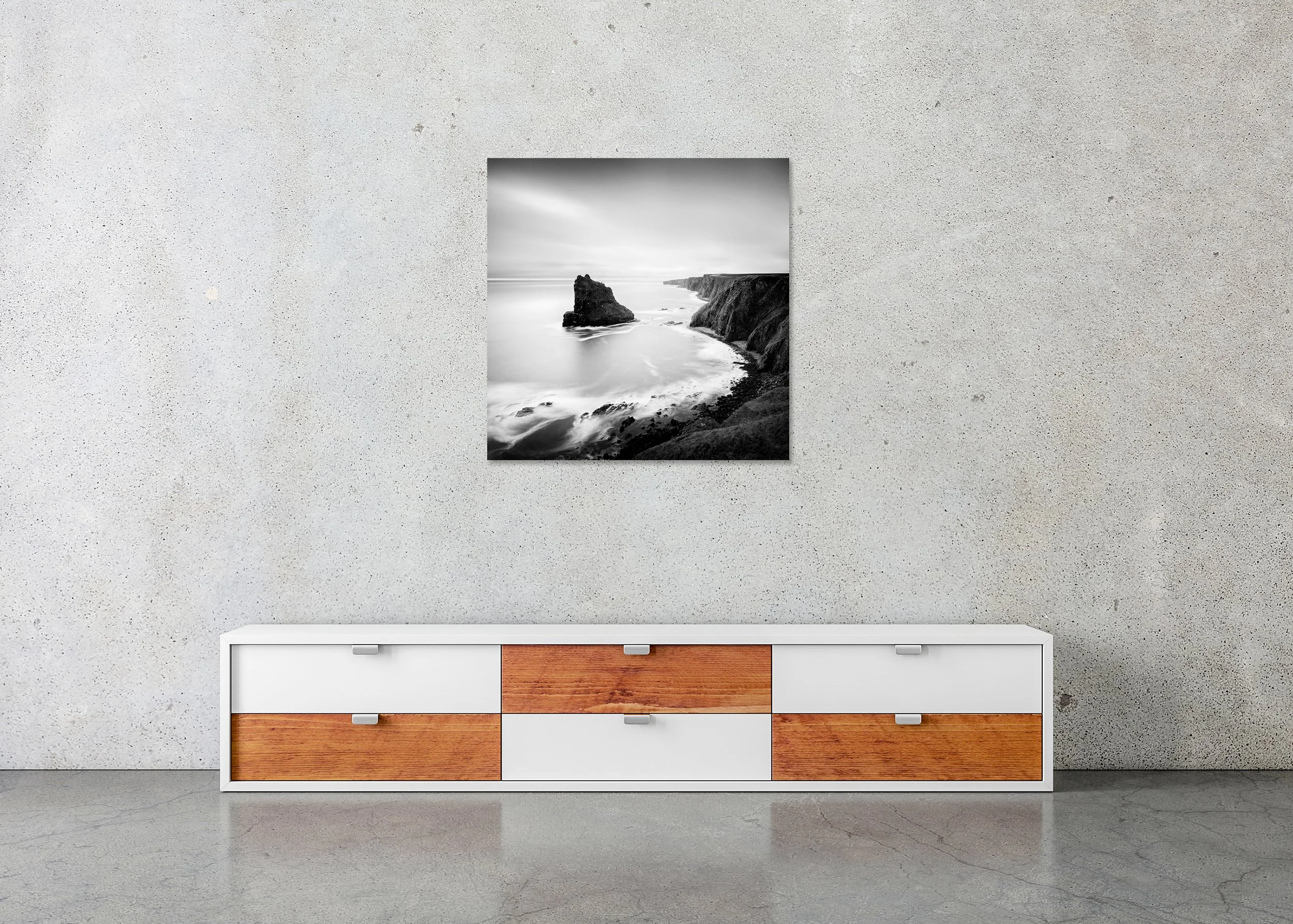 ChromaLuxe frameless black and white photograph of Scottish coastal cliffs and sea stack by fine art photographer Gerald Berghammer.