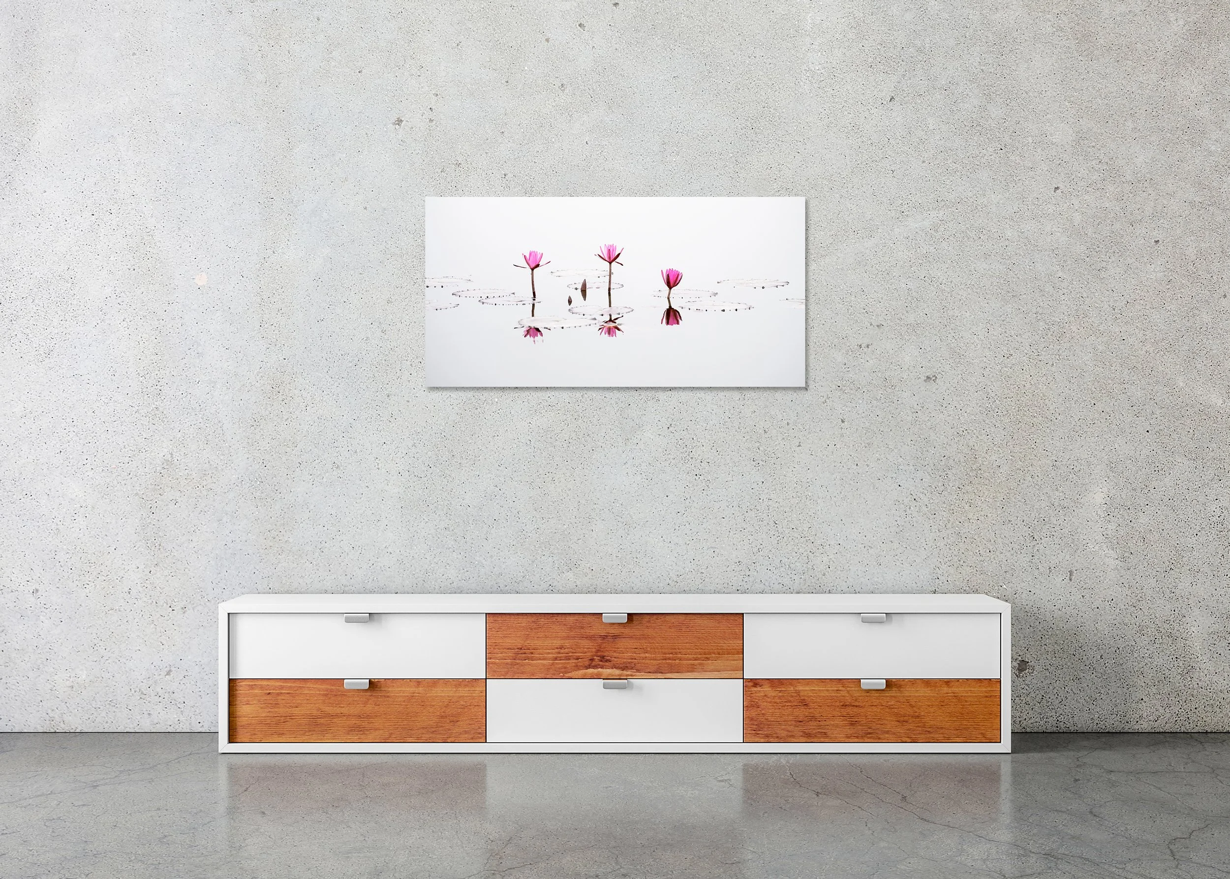 Pink lotus flowers reflected on calm water with near-perfect symmetry, minimalist fine art photograph on a frameless ChromaLuxe metal print.