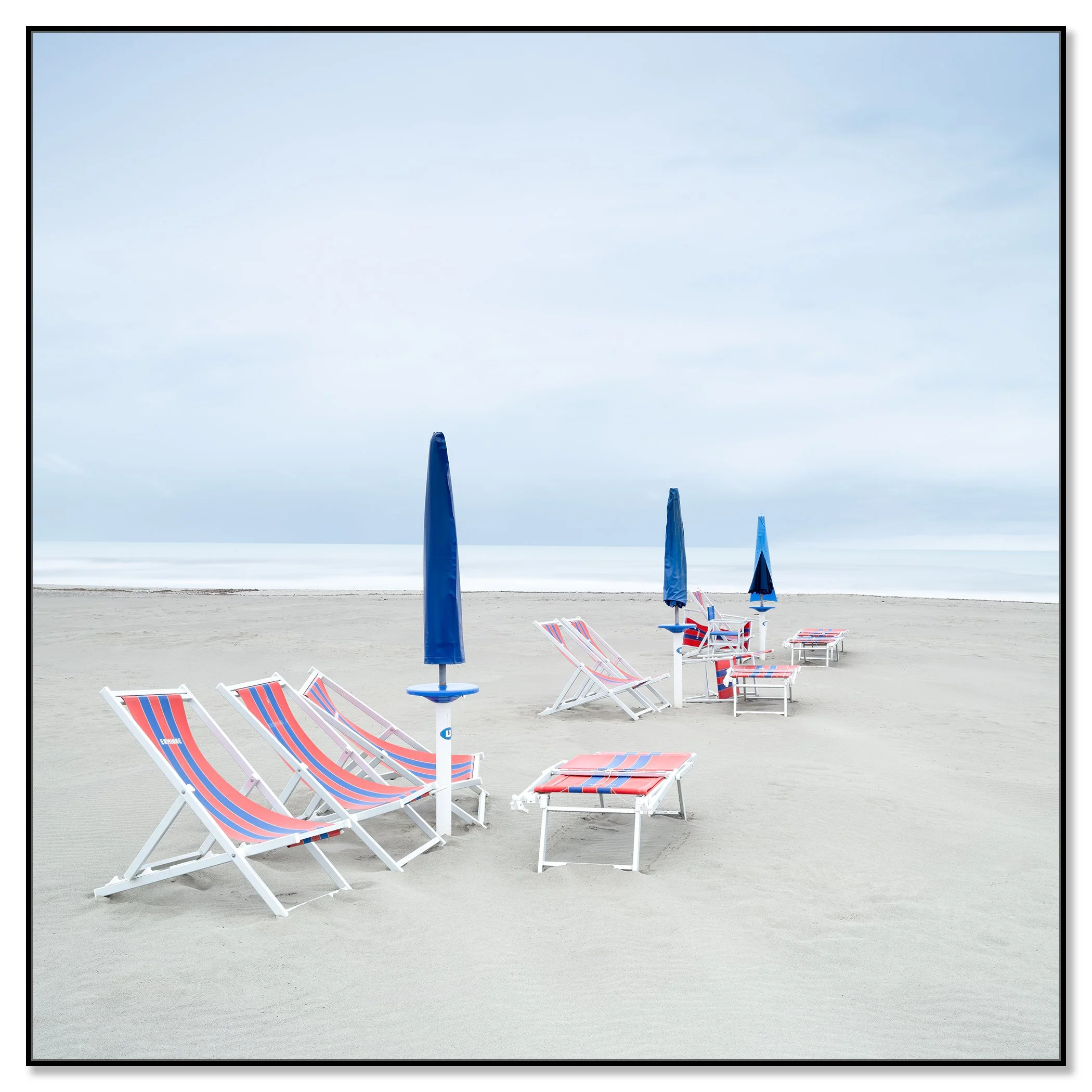 Sun Loungers on the Beach, Study 2 – colour photograph in a black aluminium ArtBox frame.