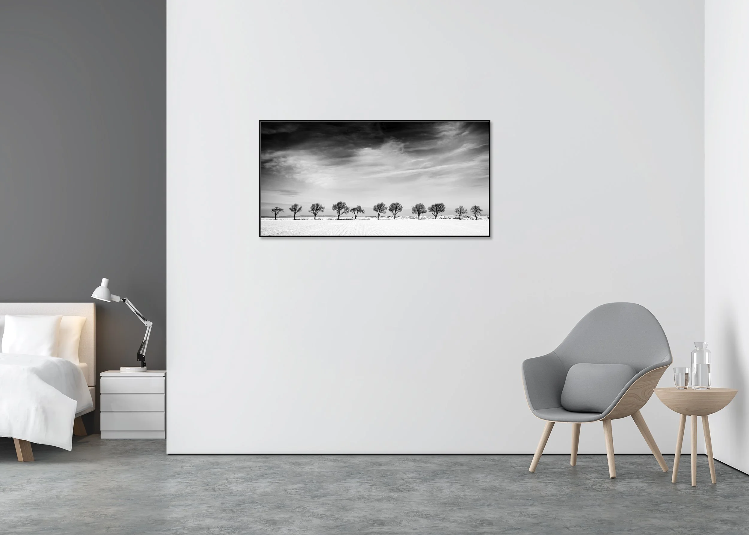Eleven Trees in a Snow Field – Austria displayed as a black-and-white photo print in an aluminium ArtBox frame.