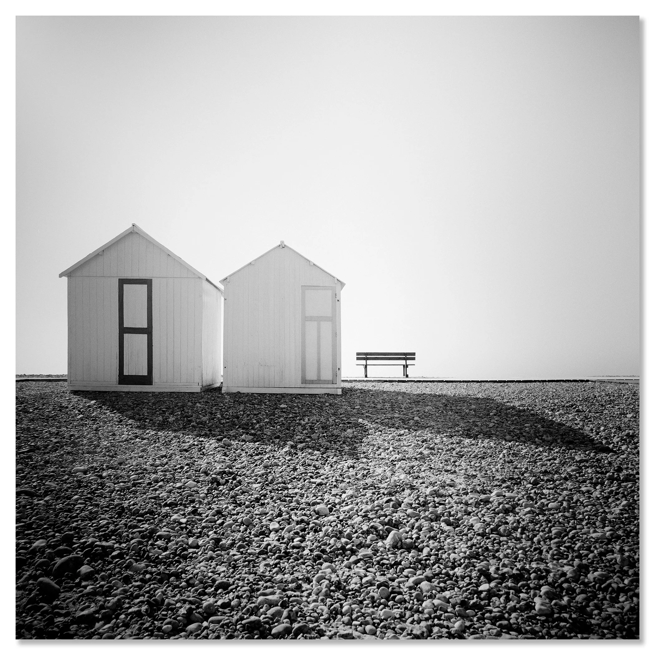 Beach Huts, Study 2 – France, frameless black-and-white photograph mounted on aluminium Dibond. Photo by Gerald Berghammer.