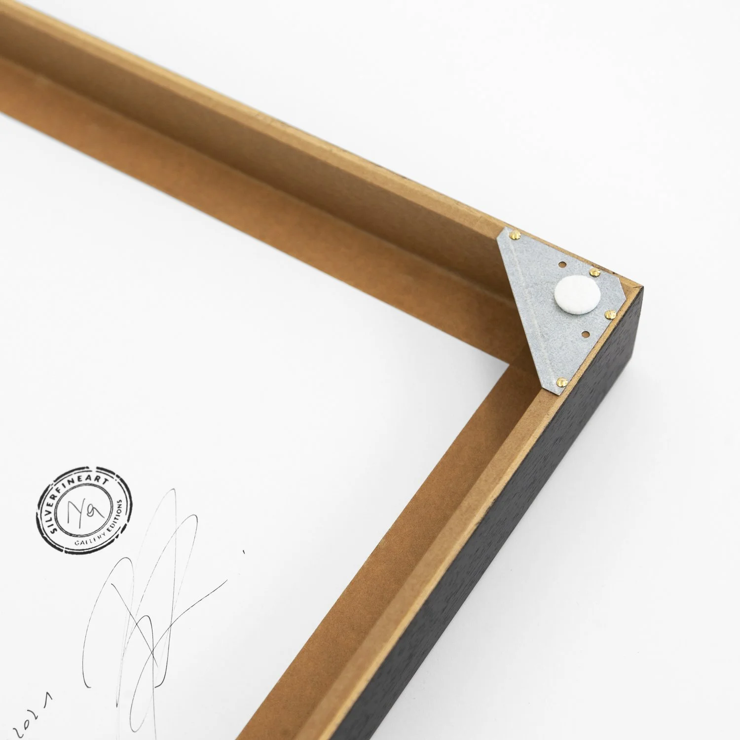 Signed and stamped reverse of Gerald Berghammer's Antelope Canyon 6, with wooden frame and metal corner detail.