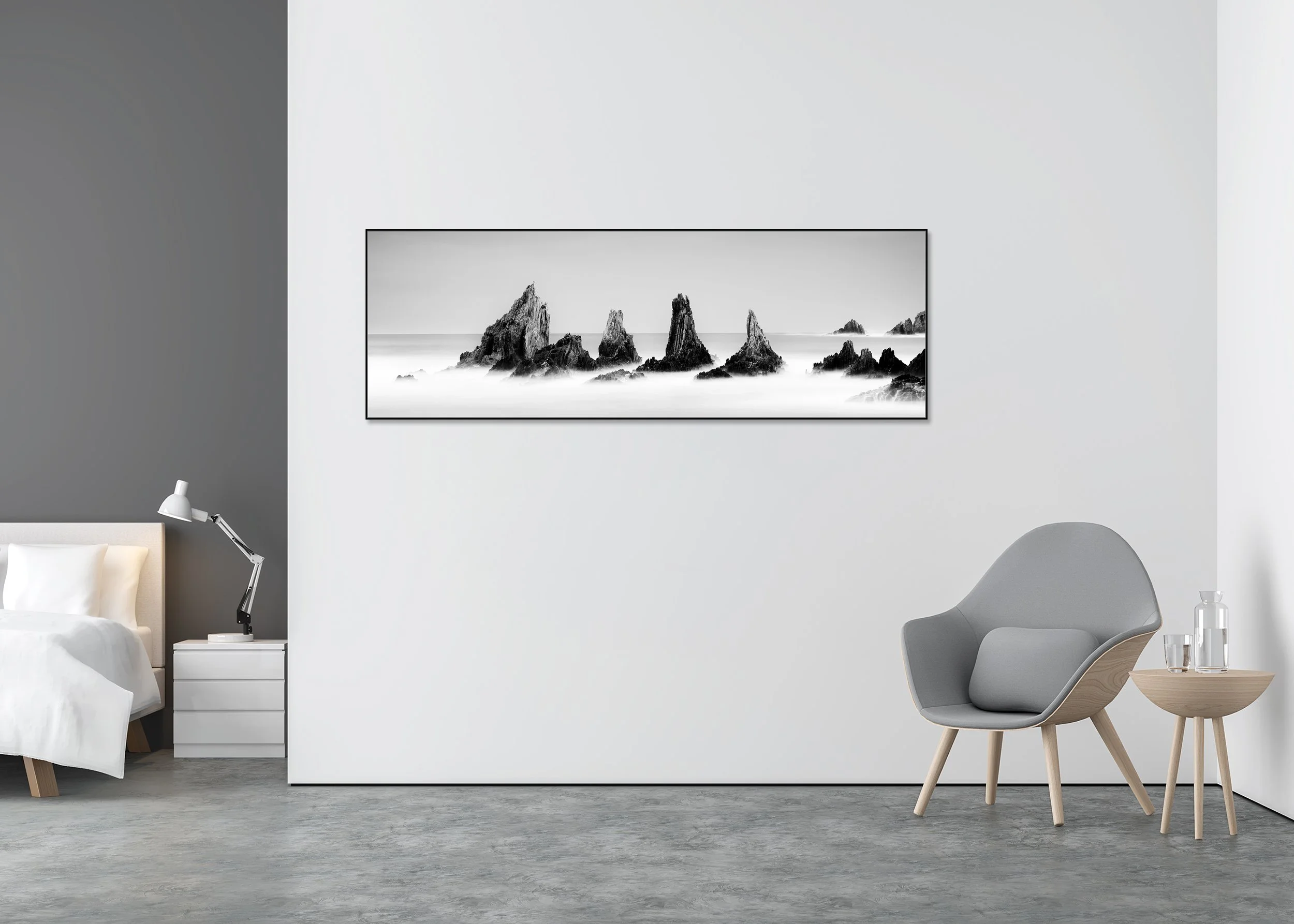 Rocky Peaks, Panorama Study 3 displayed in a minimalist bedroom as a black-and-white Dibond print in a black aluminium ArtBox by Gerald Berghammer.