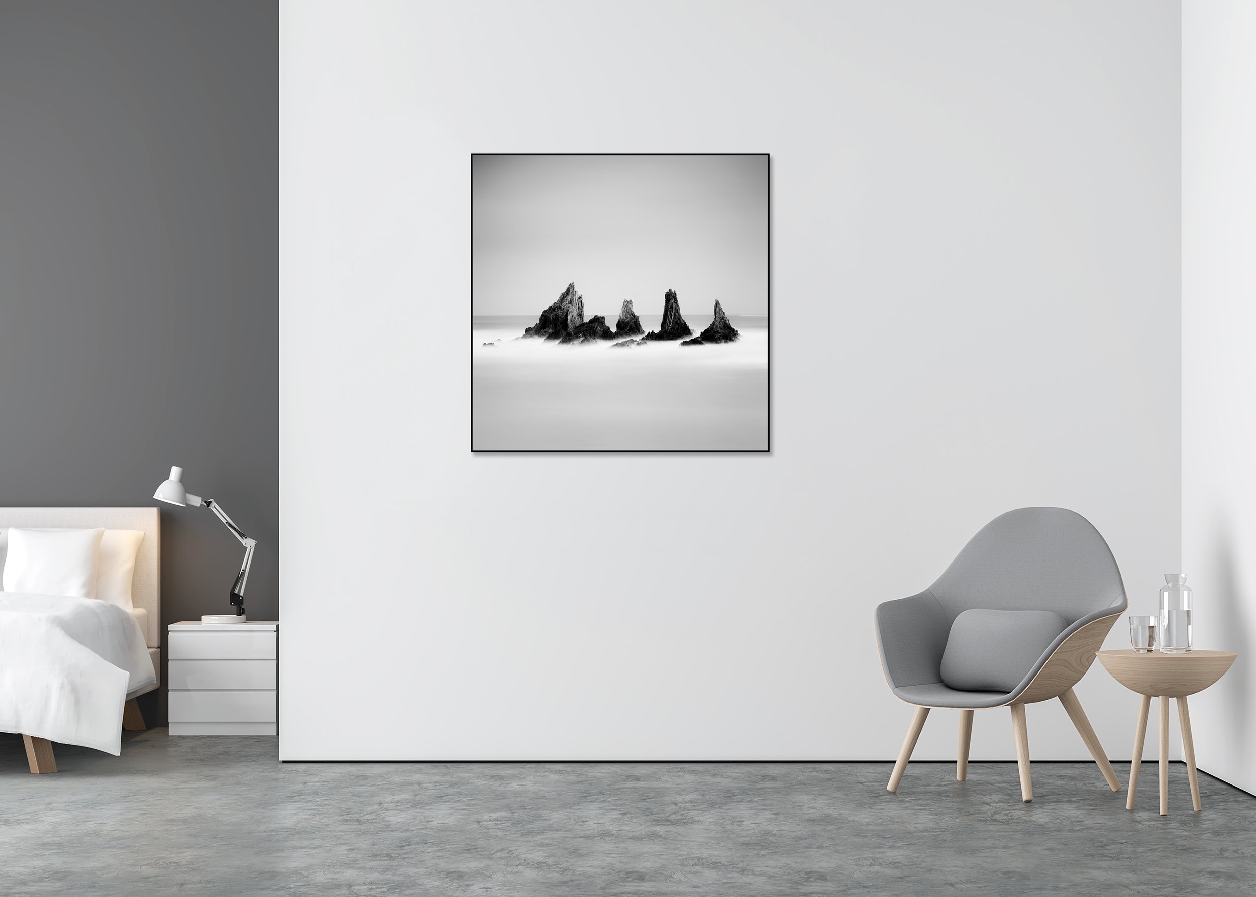 ChromaLuxe metal print in an Aluminium ArtBox featuring a black and white Atlantic seascape with five sharp sea stacks, tranquil water, and an open, cloudless sky.