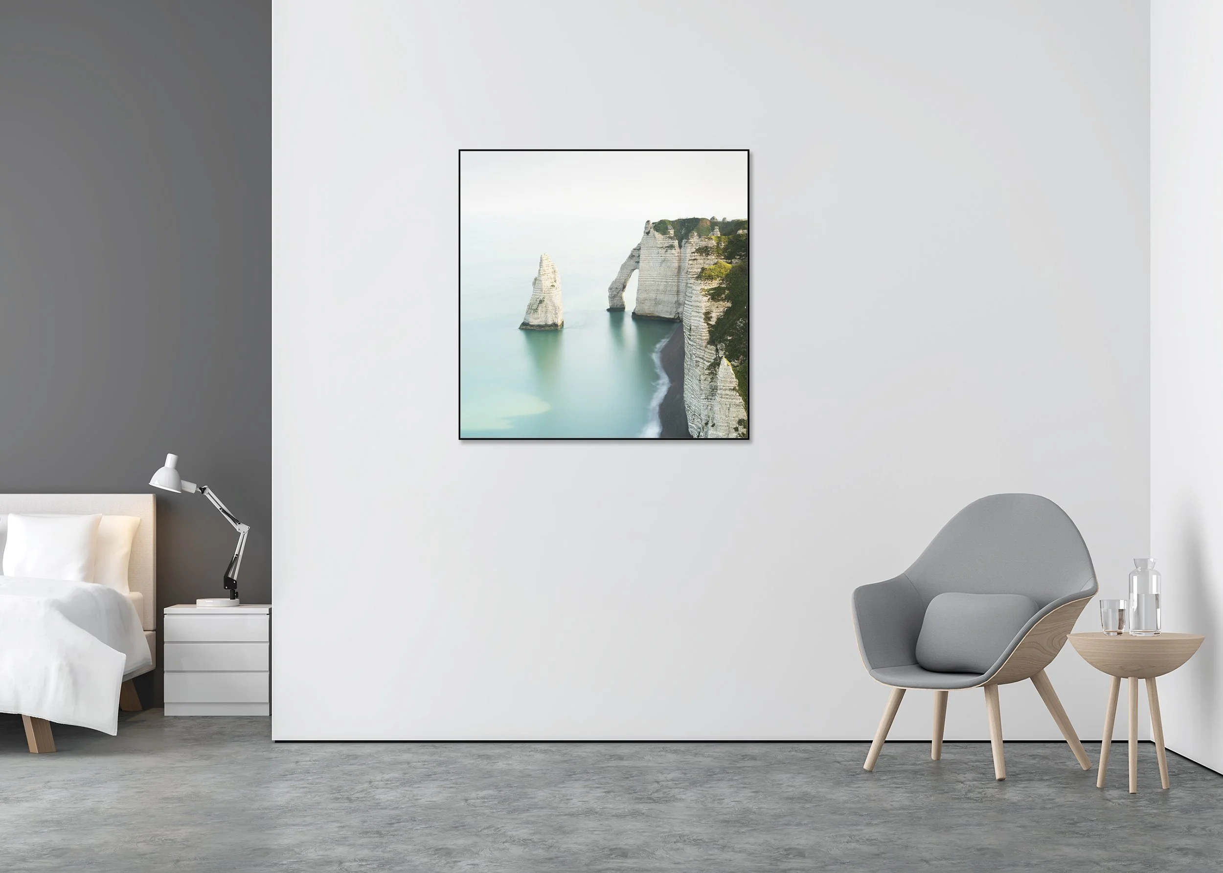 The White Cliffs of Étretat print shown on a bedroom wall in a black aluminium ArtBox