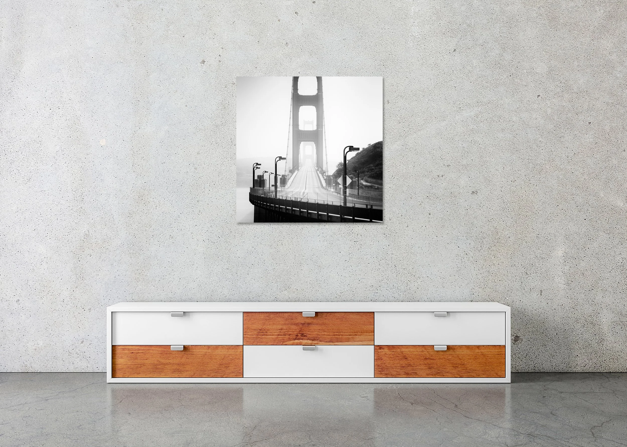 Golden Gate Bridge Study 7 displayed in a modern interior as a frameless black-and-white artwork mounted on aluminium Dibond by Gerald Berghammer.