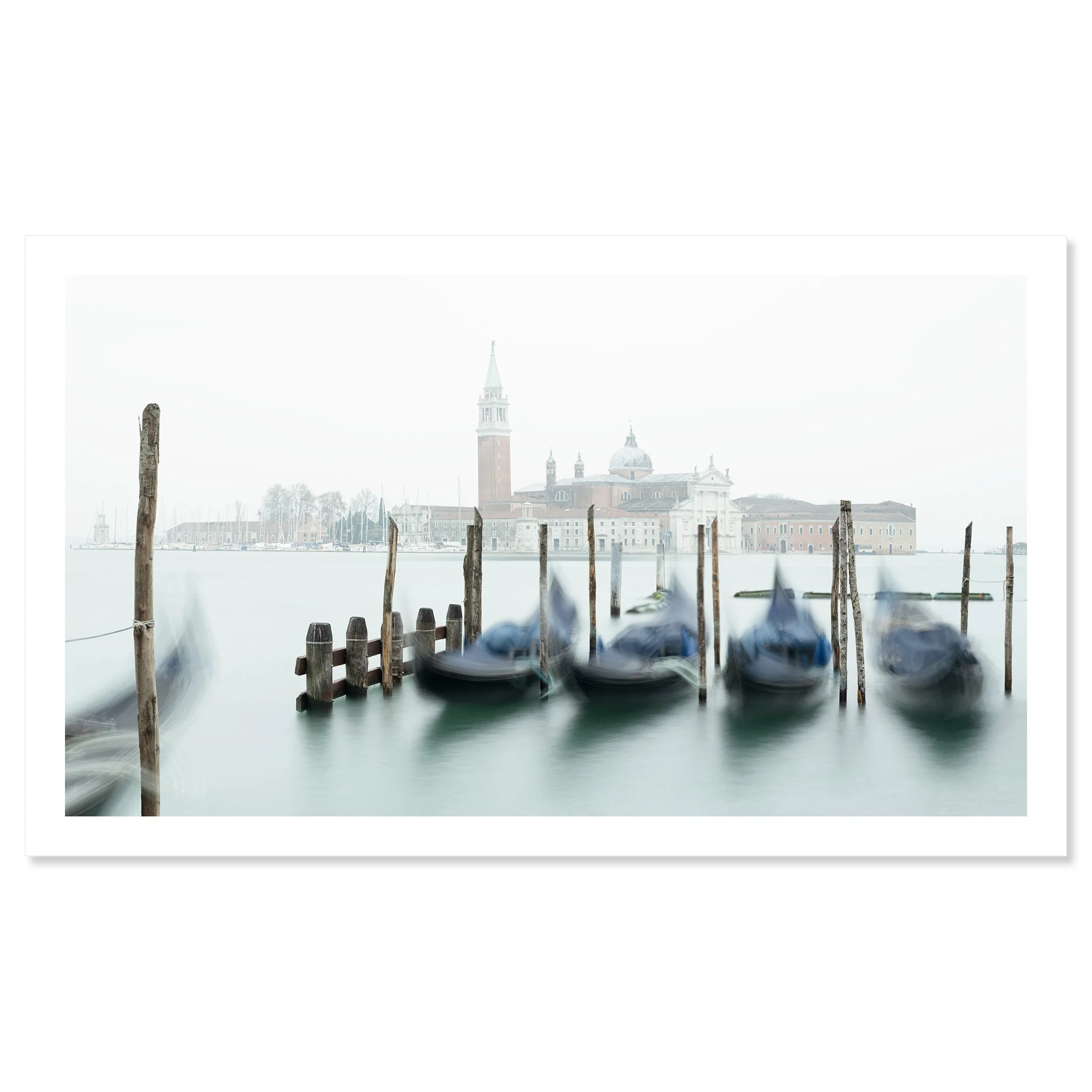 Gerald Berghammer - Color cityscape photography. Gondolas docked along wooden posts on a misty water canal and in back San Giorgio Maggiore Church. Fine art print only