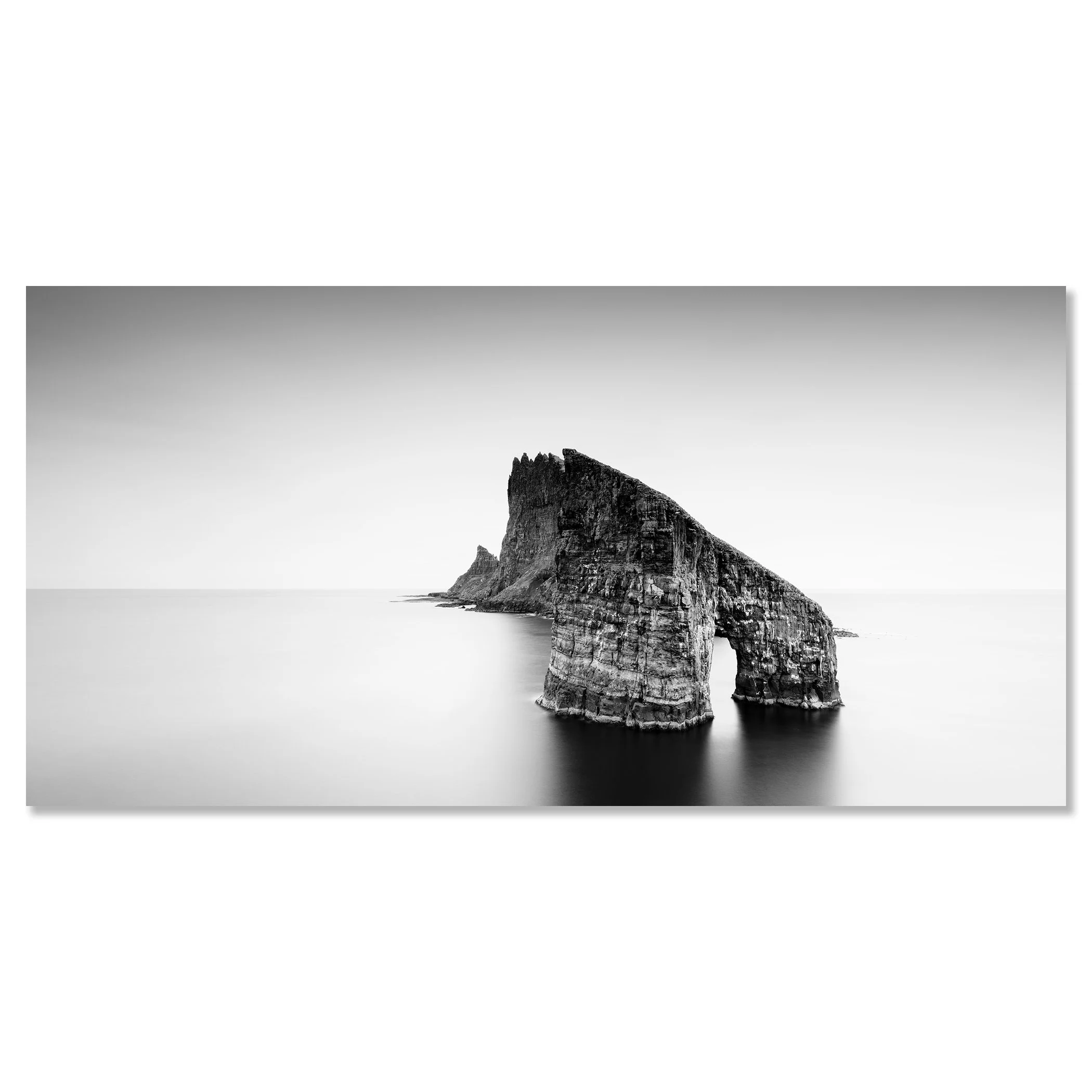 Drangarnir Sea Arch Panorama, Faroe Islands, shown as a frameless black-and-white photograph mounted on aluminium Dibond by Gerald Berghammer.