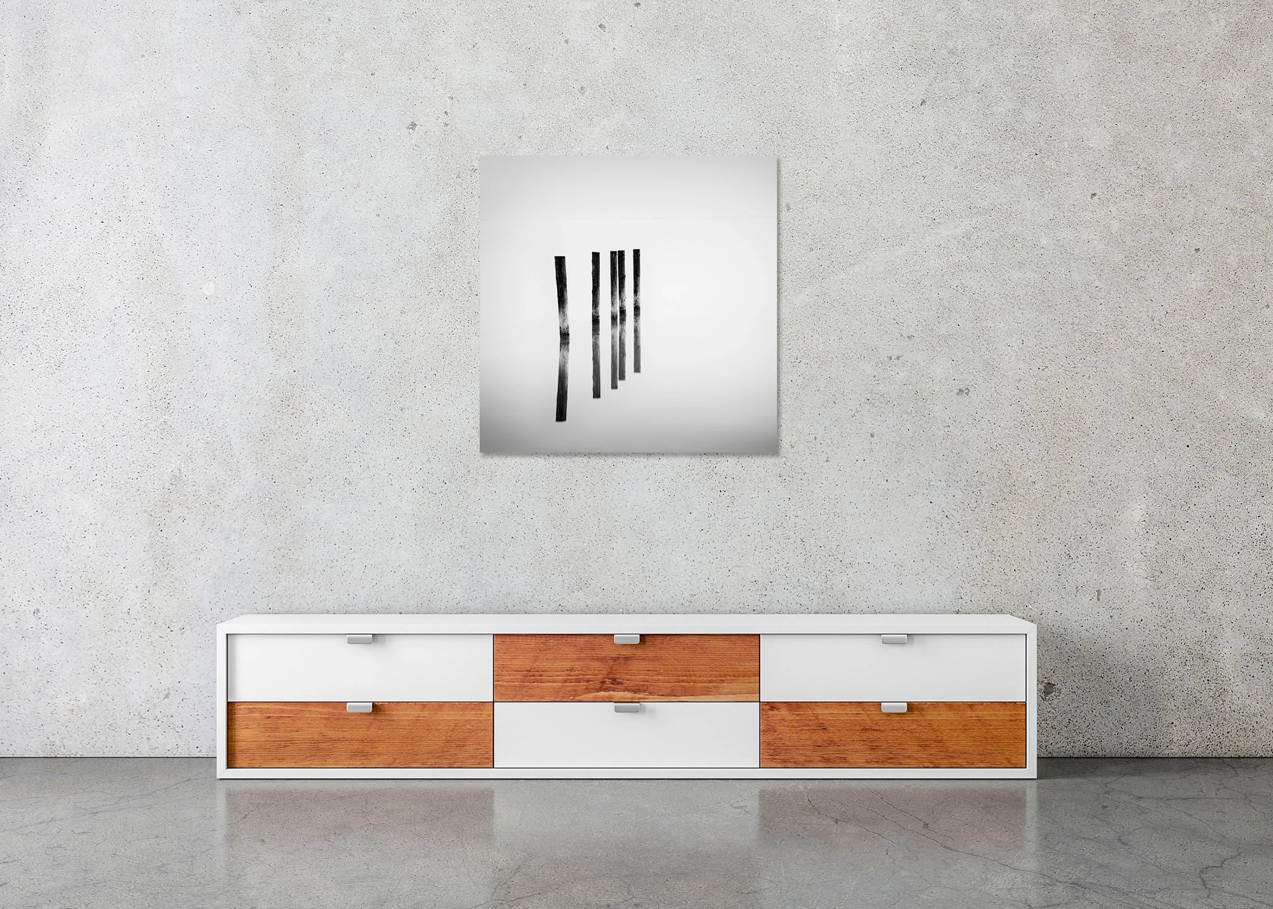 Abstract black and white photograph of five upright timber posts mirrored on a smooth reflective floor, photo print mounted to Dibond, frameless