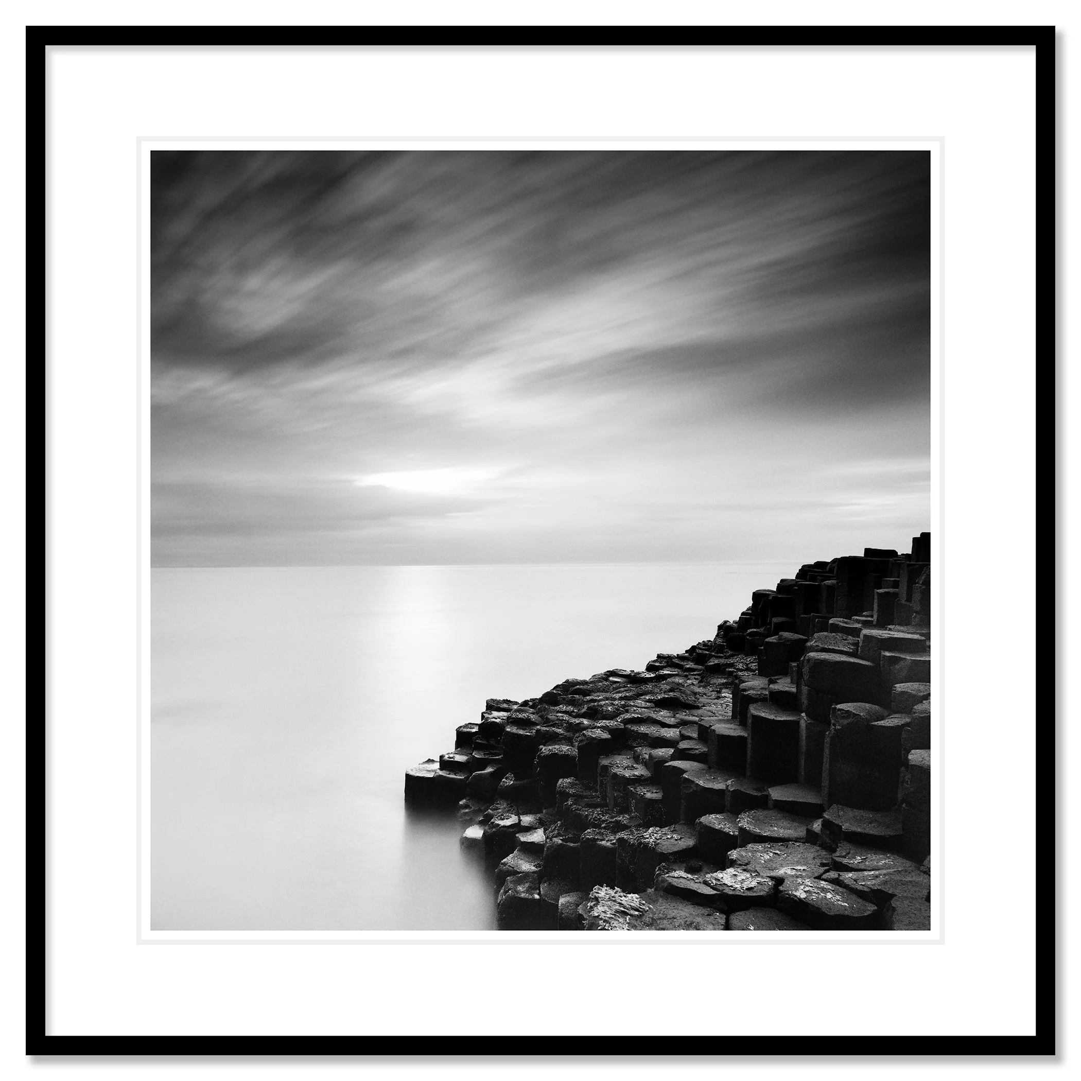 Giant’s Causeway Study 3 by Gerald Berghammer, black-and-white fine art print in a black aluminium frame with white mount.