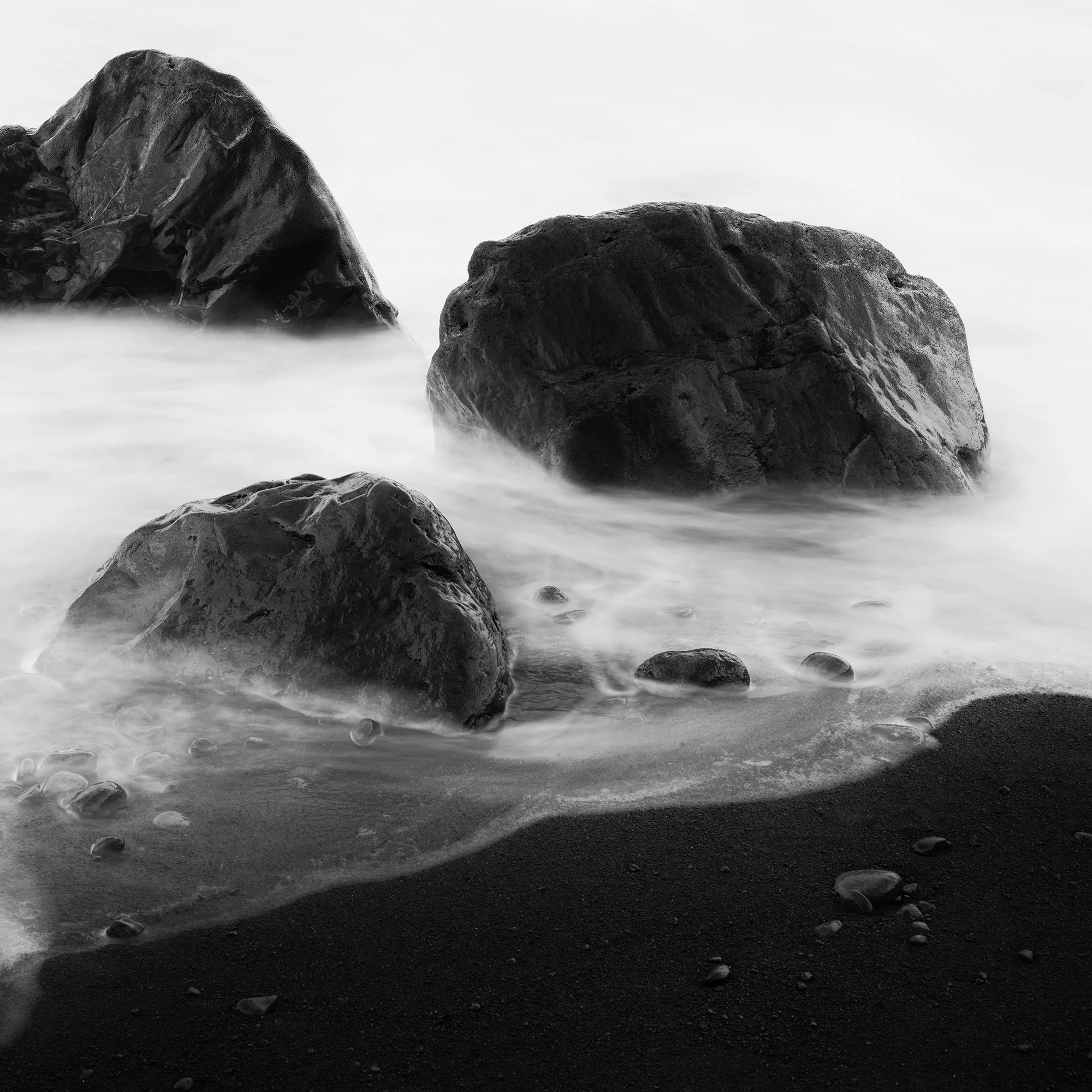 Detail of the black-and-white seascape print showing tonal gradations in waves and rocks.