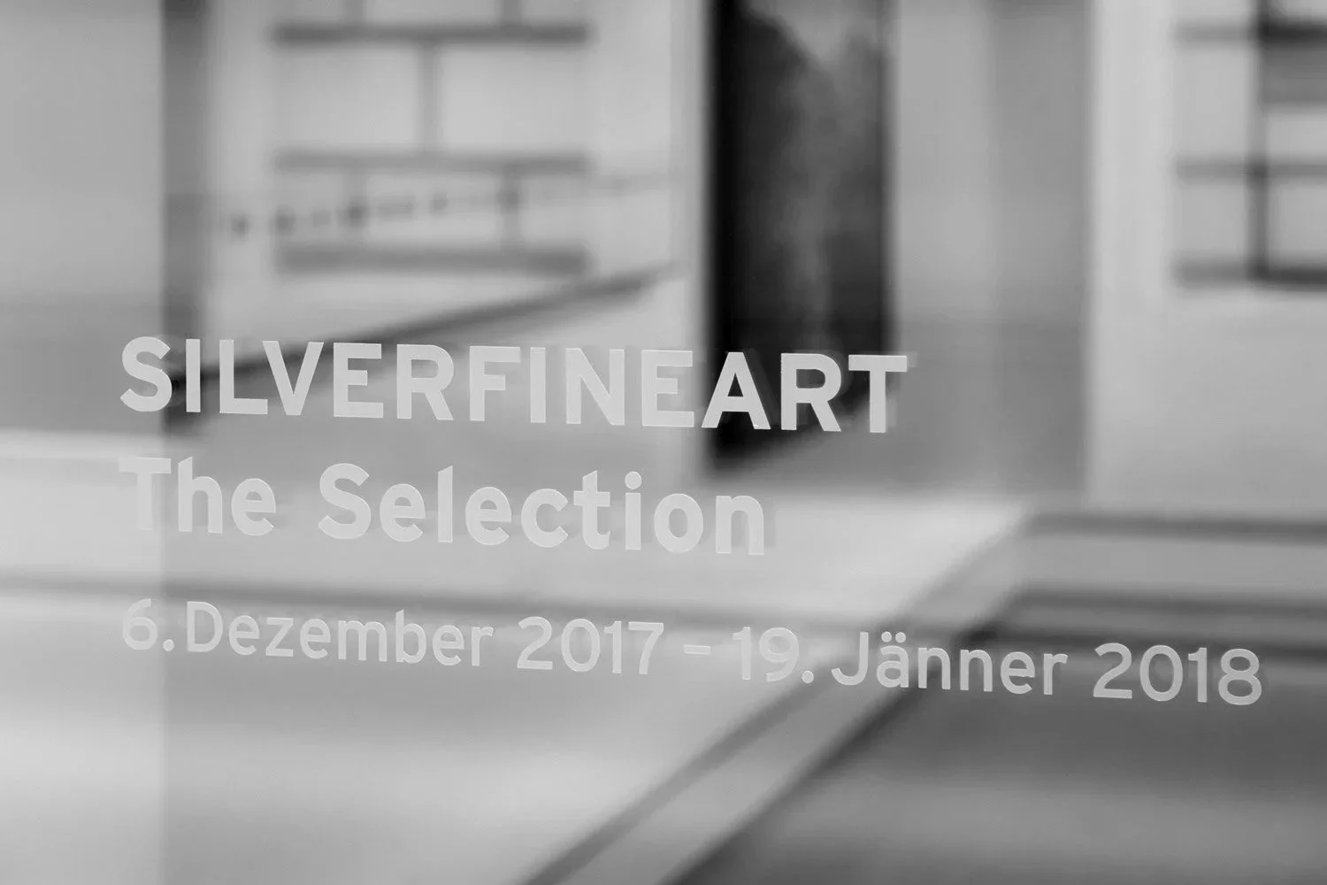 Exhibition lettering for THE SELECTION by Gerald Berghammer, showing the SILVERFINEART name and exhibition dates on the window of Bildraum 01 in Vienna.
