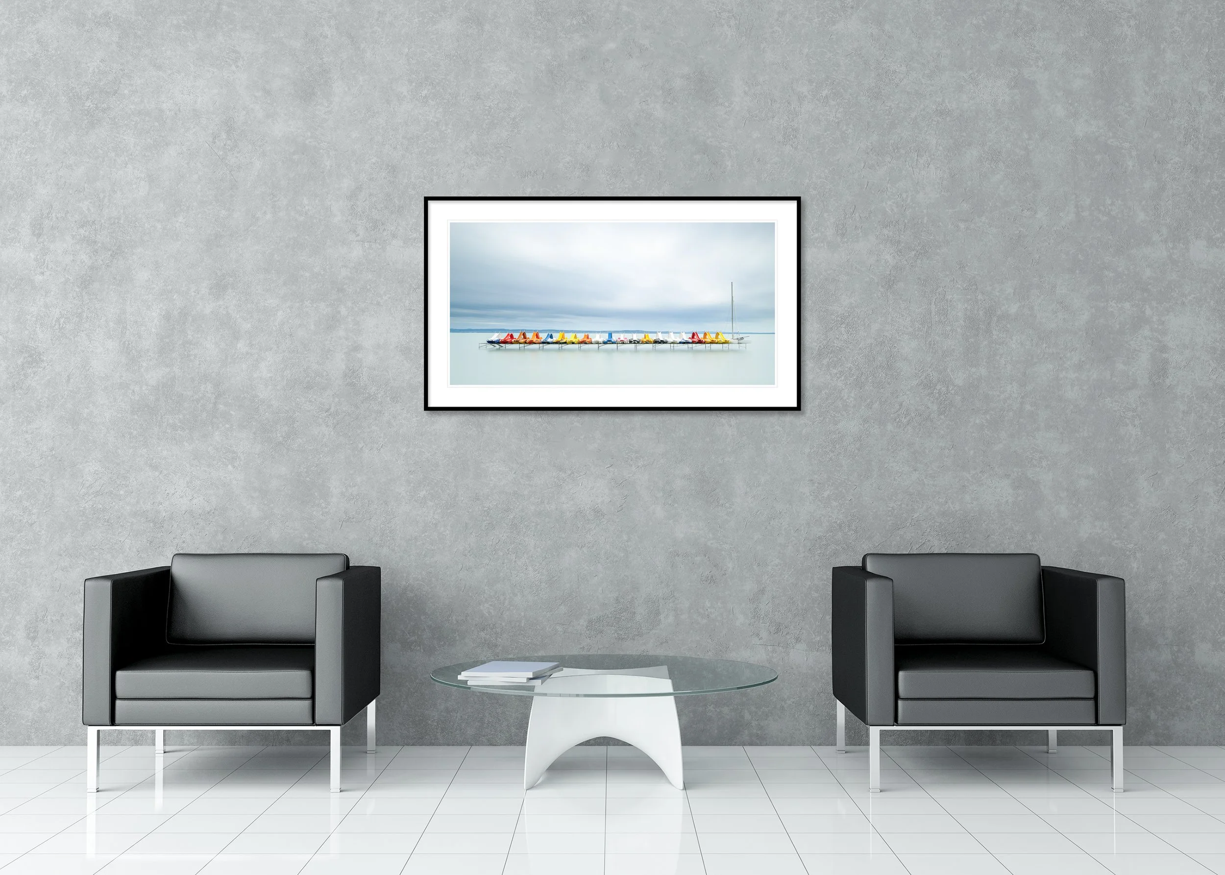 Pedal Boats and a Catamaran displayed in a modern lounge as an archival pigment print in a black aluminium frame with a white mount by Gerald Berghammer.