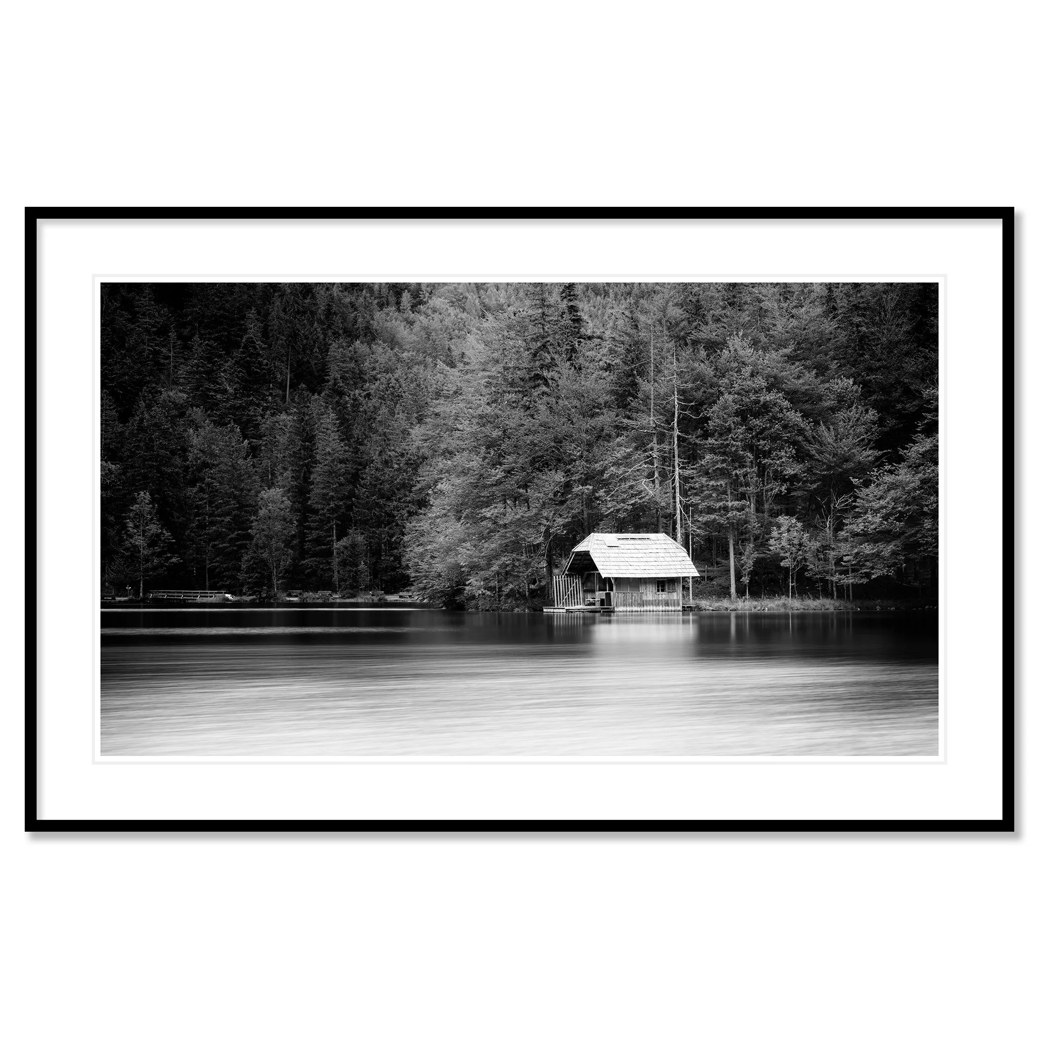 Wooden Boathouse Panorama as an archival pigment print in a black aluminium frame with a white mount by Gerald Berghammer.