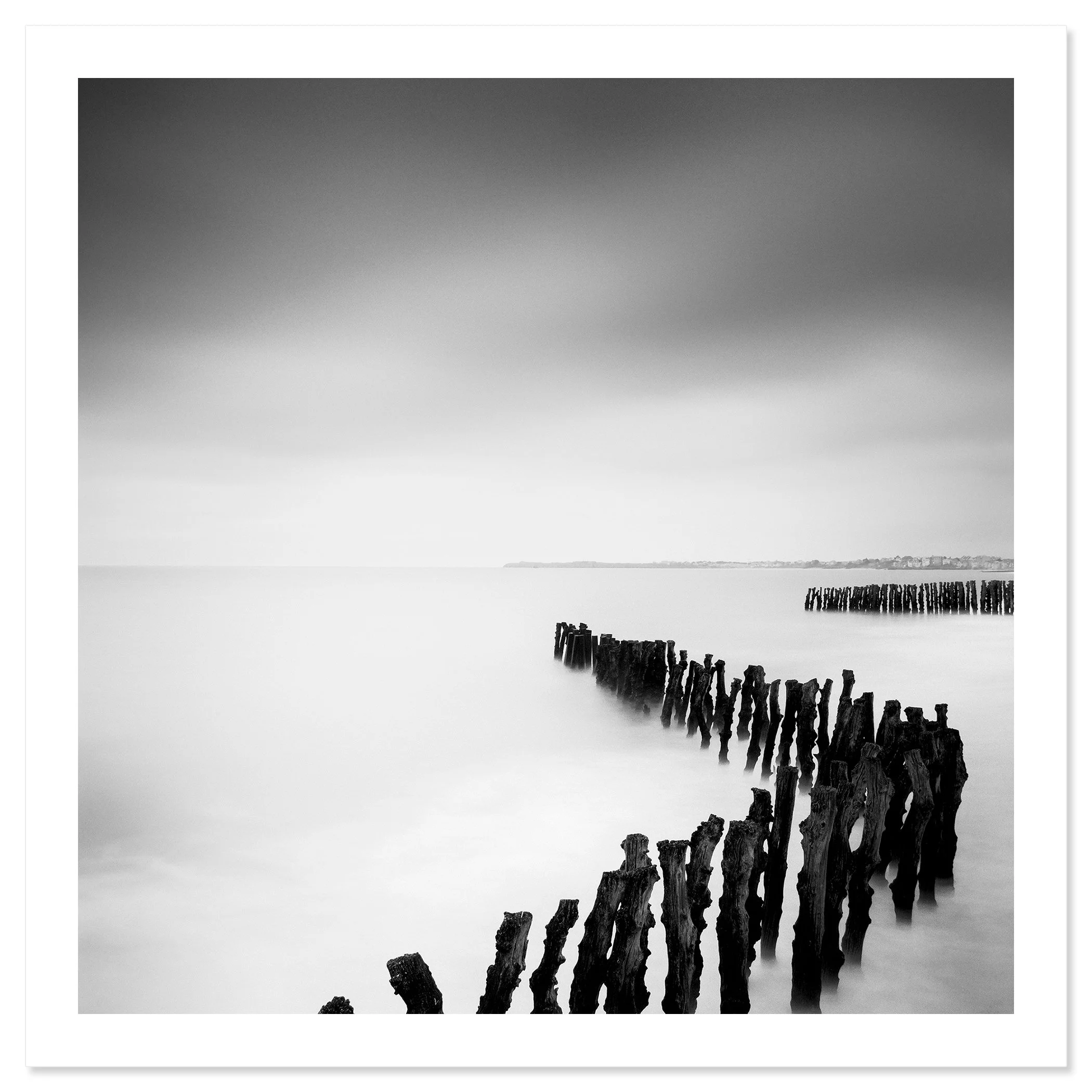 Sea Breakers black-and-white fine art print with white border, photographed on the French Atlantic coast by Gerald Berghammer.