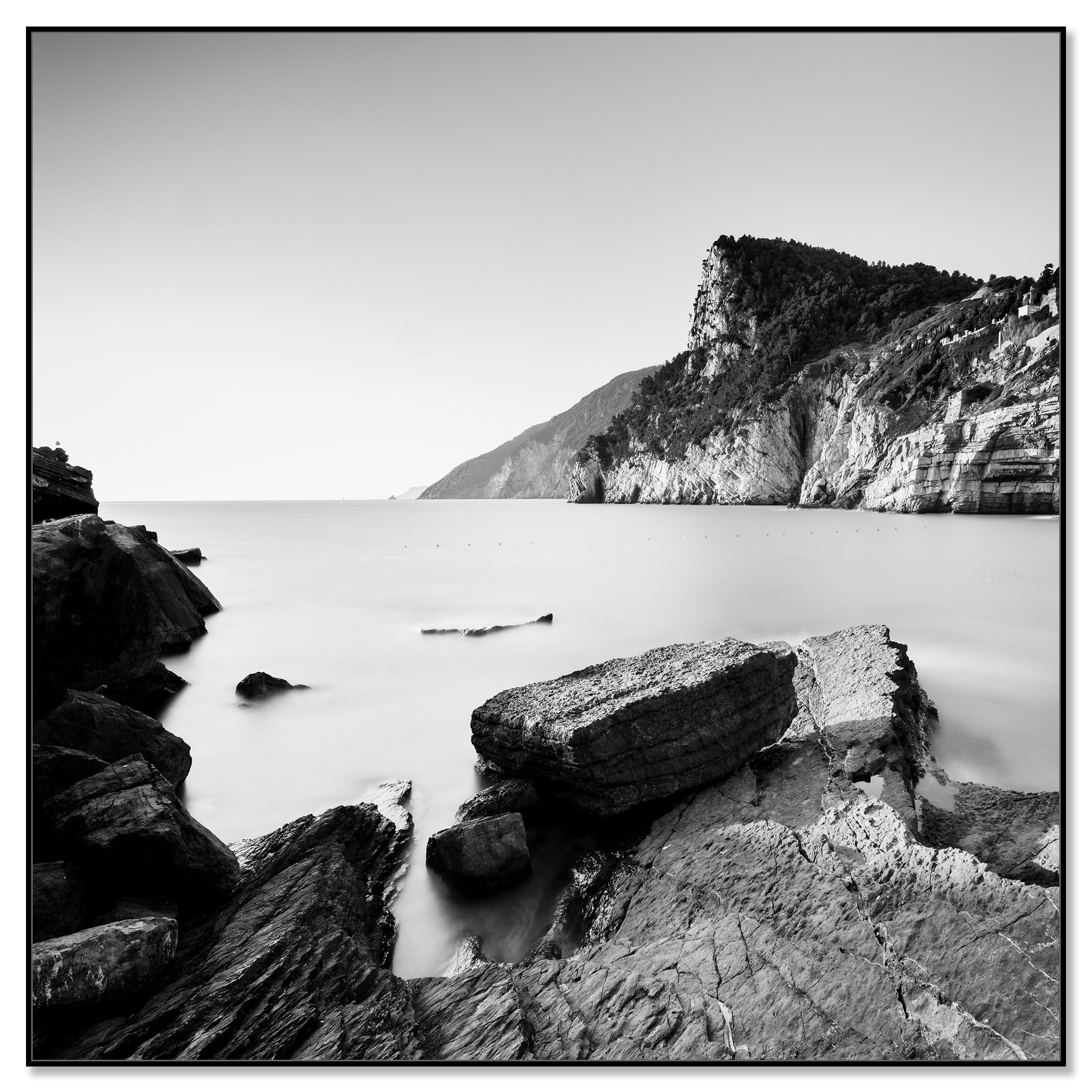 The Rocky Coast of Porto Venere – black-and-white photograph presented in a black aluminium ArtBox frame.