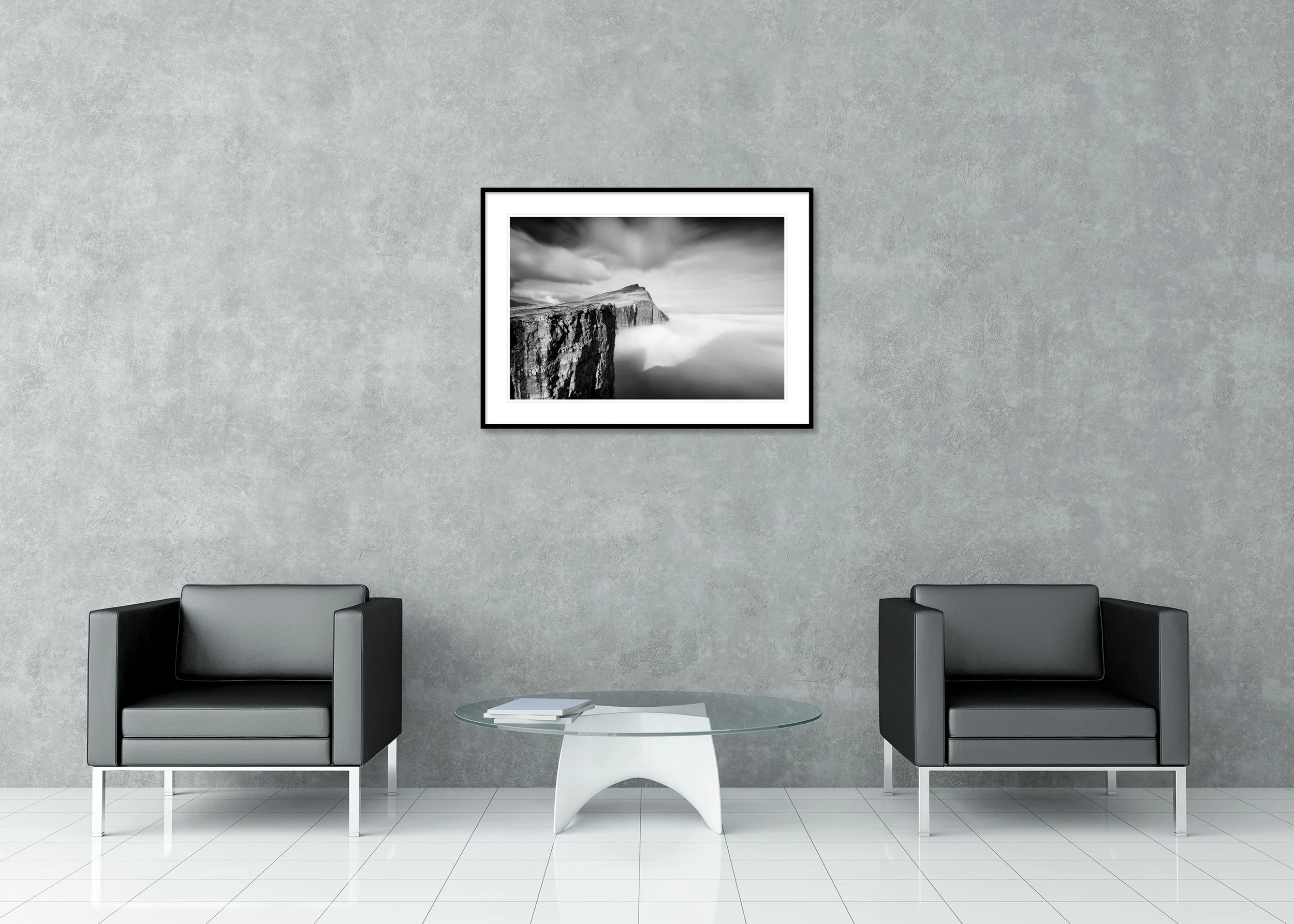 Foggy Slave Cliff, Study 1 – Faroe Islands, archival pigment print in a black aluminium frame with a white mount displayed in a modern interior. Photo by Gerald Berghammer.