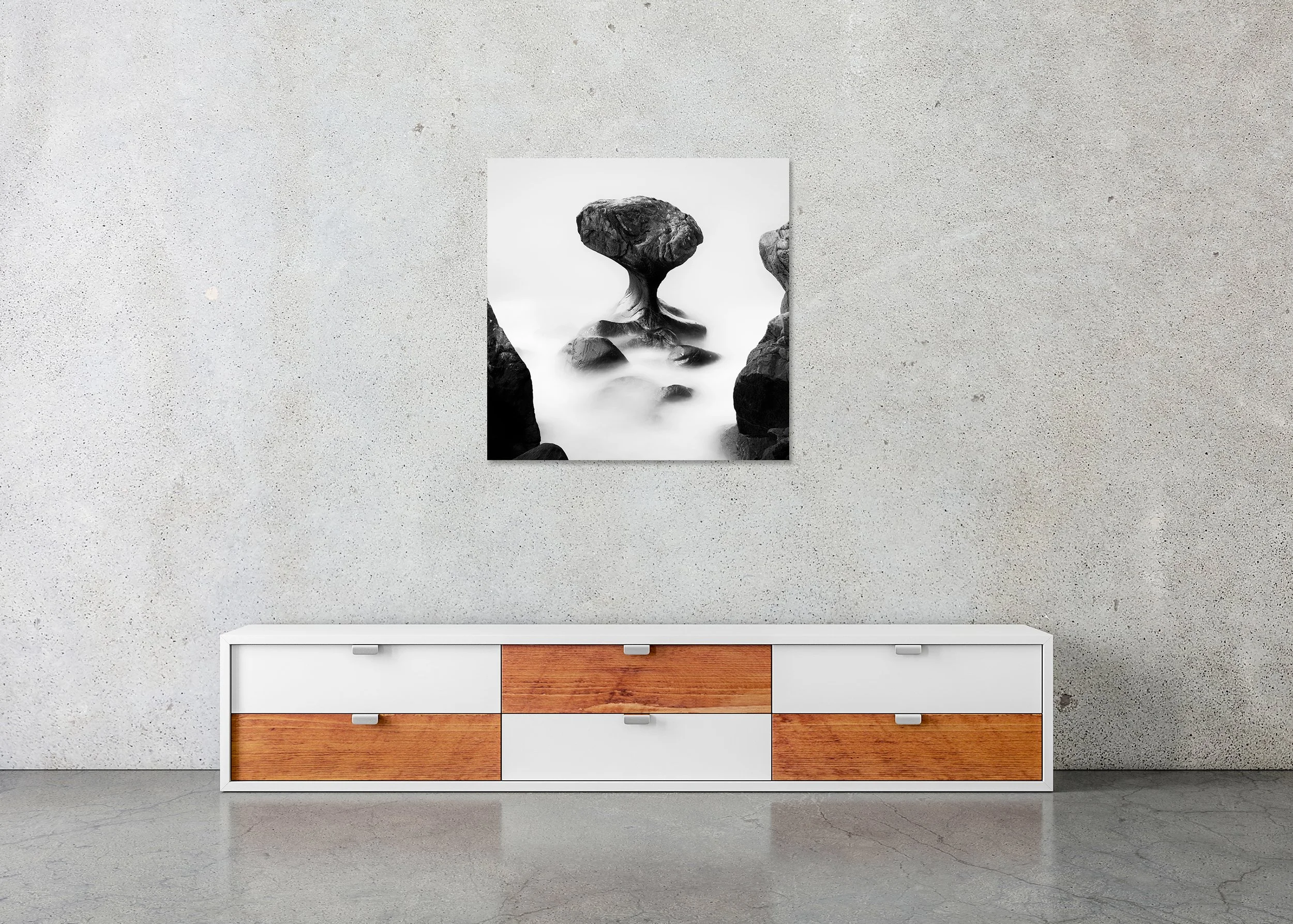 Attracted by the Sea Study 2 displayed in a modern interior as a frameless black-and-white aluminium Dibond print by Gerald Berghammer.