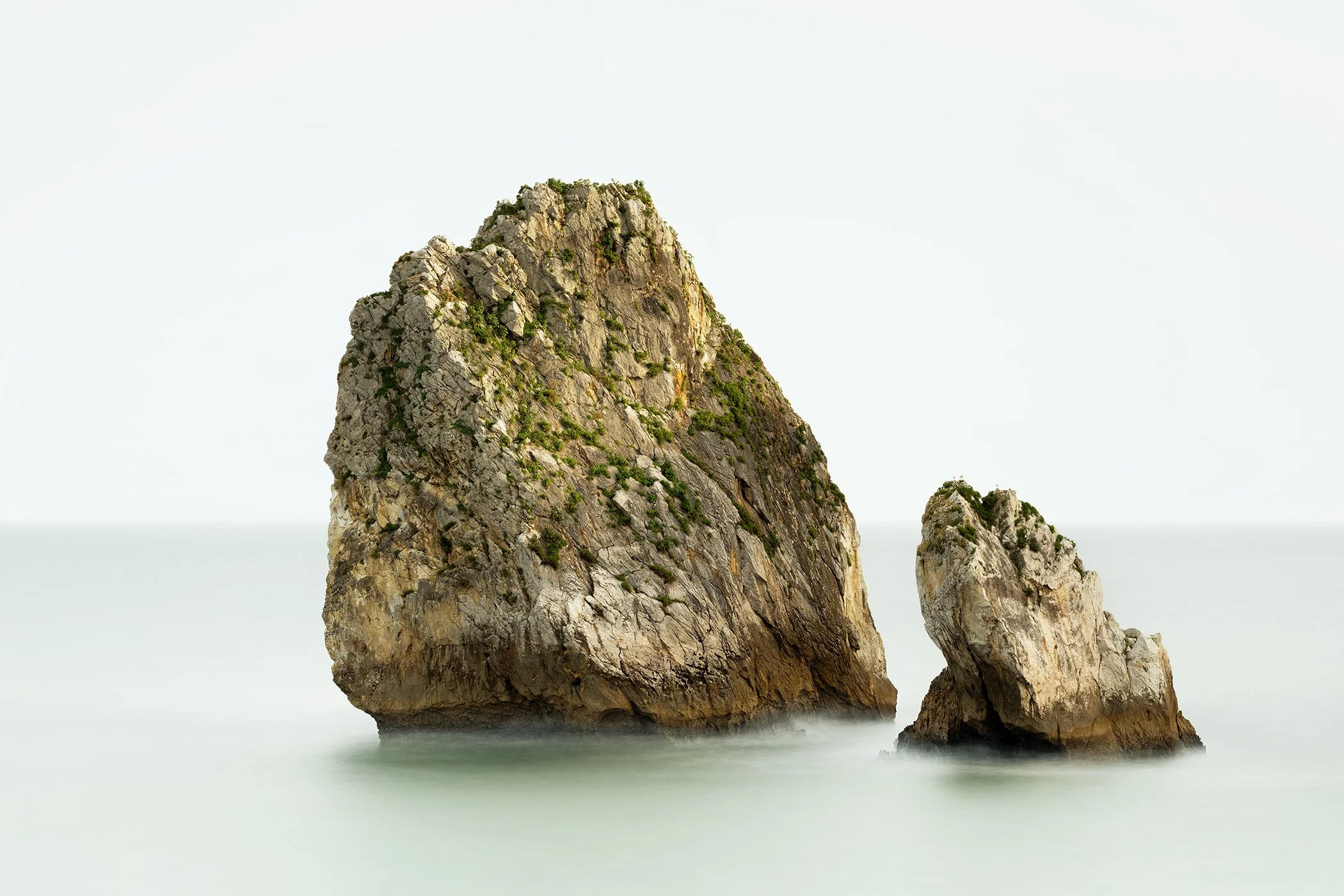 Two Rocks in the Sea Study 1 by Gerald Berghammer, minimalist colour long-exposure photograph of two sea stacks off the coast of France.