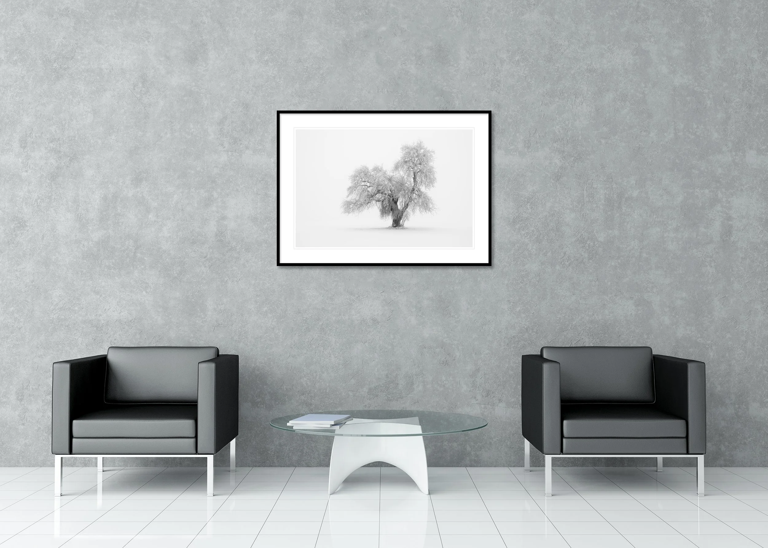 Minimalist Winter Tree Study 1 displayed in a modern interior as an archival pigment print in a black aluminium frame with a white mount by Gerald Berghammer.