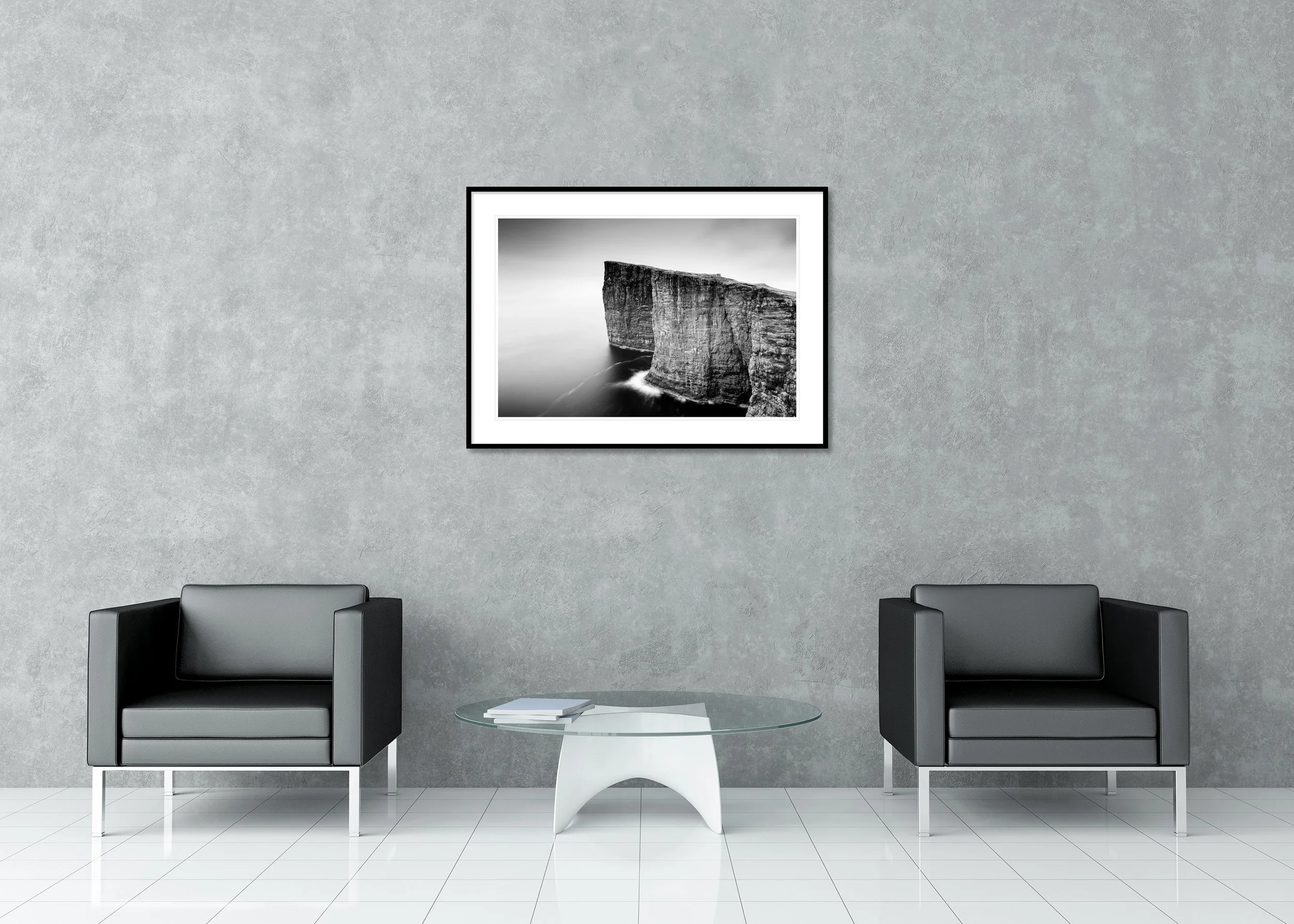 Monochrome Faroe Islands sea cliffs rising from the ocean, archival pigment print in a classic frame with a mount
