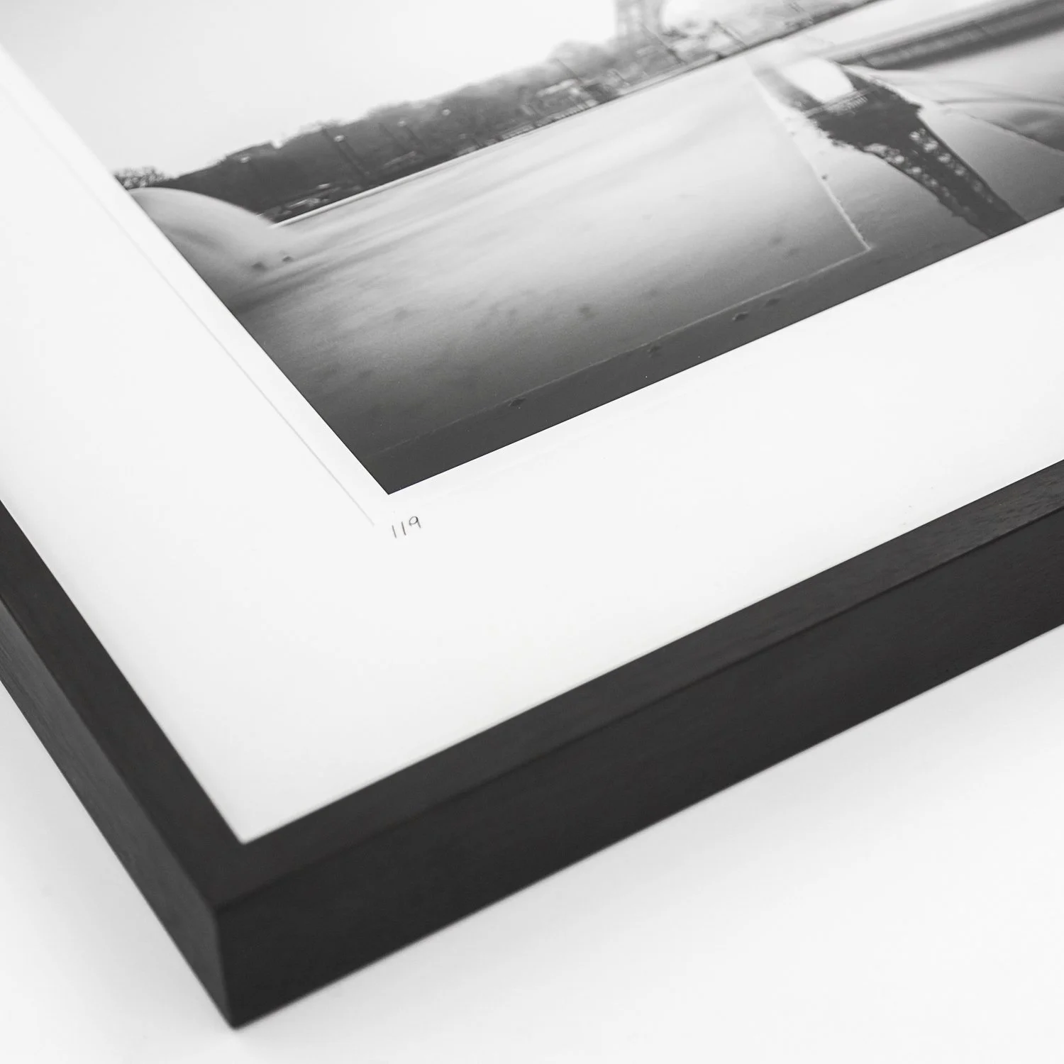Detail of the artist's handwritten signature and black wooden frame on Eiffel Tower Study 1 – Gerald Berghammer.