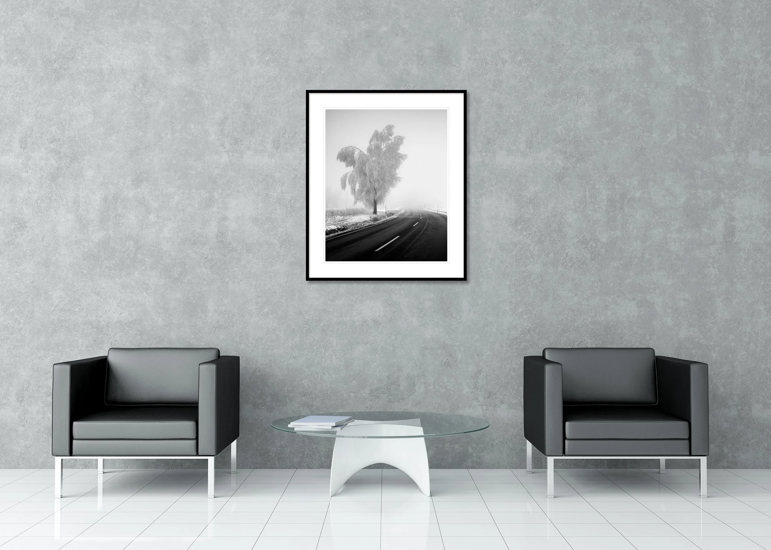 Black and white archival pigment print of a frosted roadside tree and curving road in heavy fog, presented in a classic frame with a mount