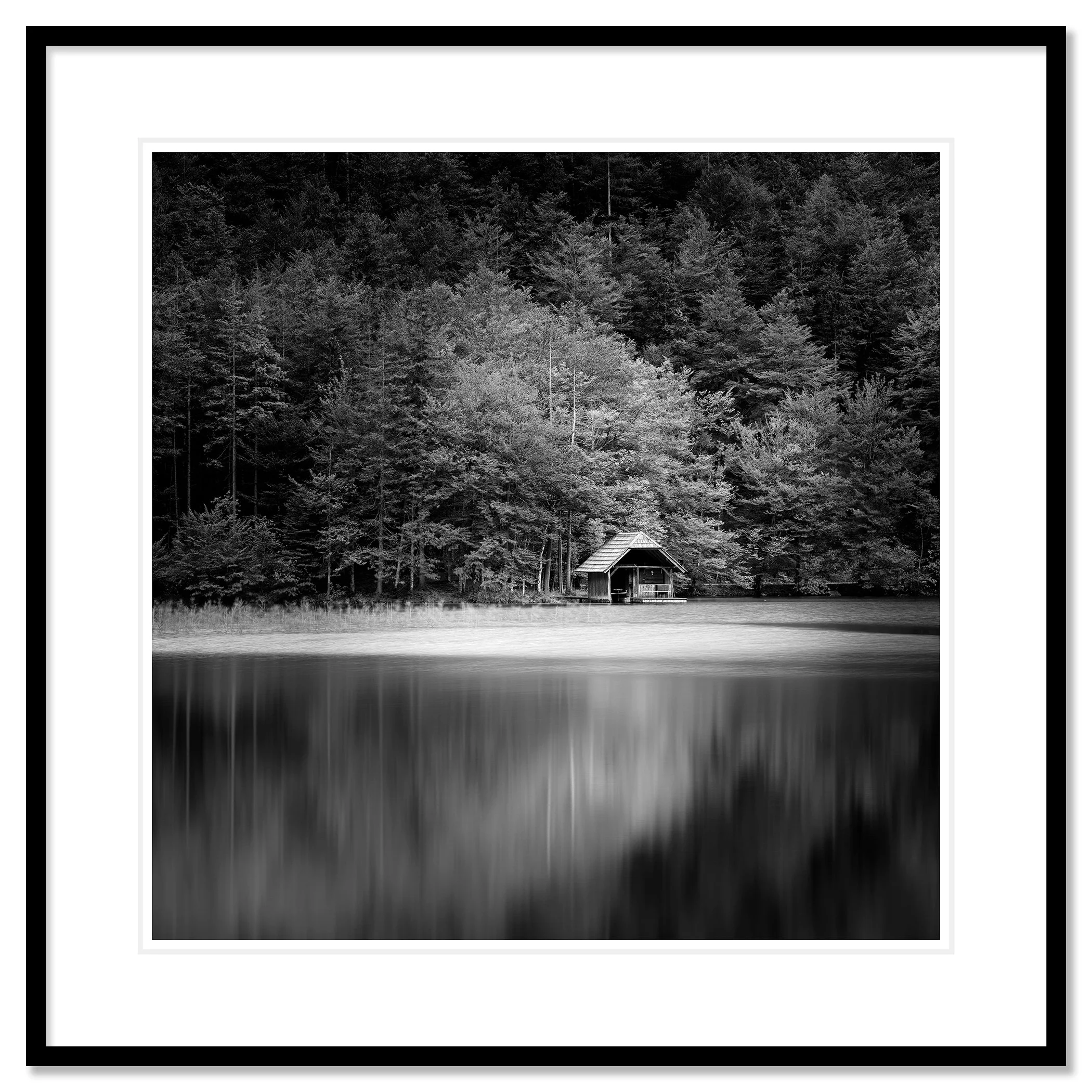 Wooden Boathouse, Study 2 presented as an archival pigment print in a black aluminium frame with a white mount by Gerald Berghammer.