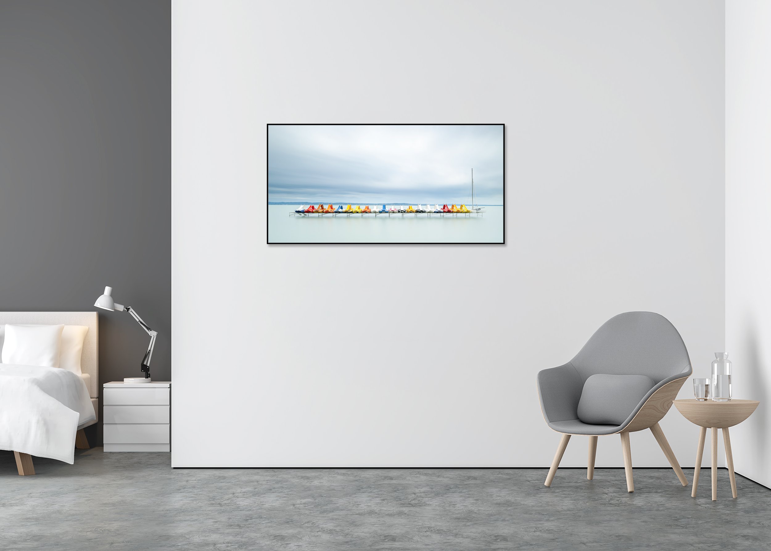 Pedal Boats and a Catamaran displayed in a modern bedroom as a Dibond print in a black aluminium ArtBox frame by Gerald Berghammer.