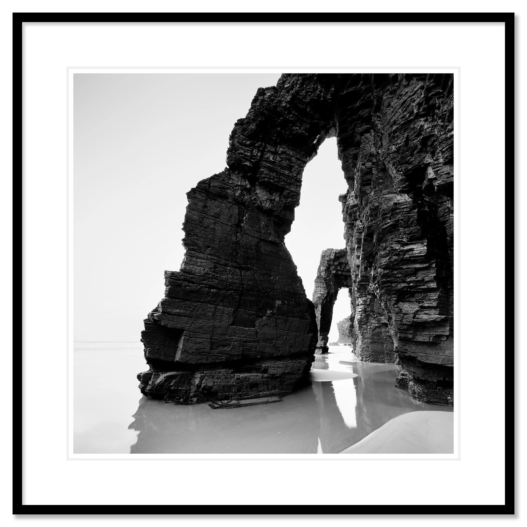 Arches on Catedrais Beach Study 4 as an archival pigment print in a black aluminium frame with a white mount by Gerald Berghammer.