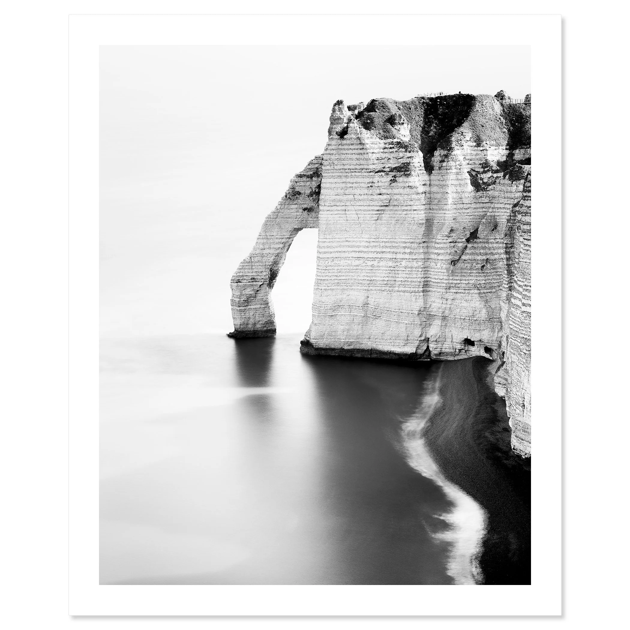 The Sea Arch at Étretat, France, archival pigment print on Baryta paper. Photo by Gerald Berghammer.