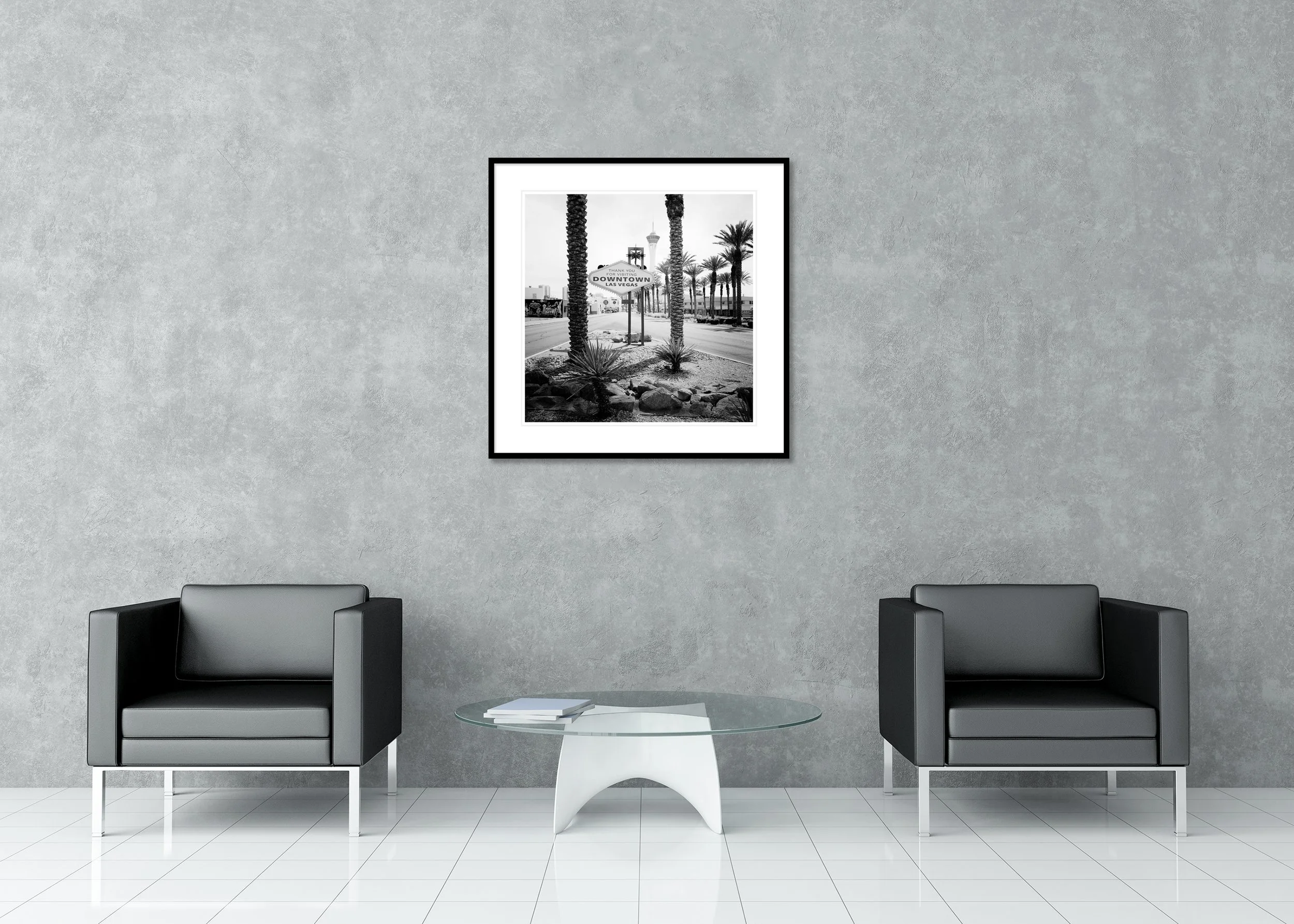 Downtown Las Vegas – archival pigment print in a black aluminium frame with a white mount, displayed in a modern interior.