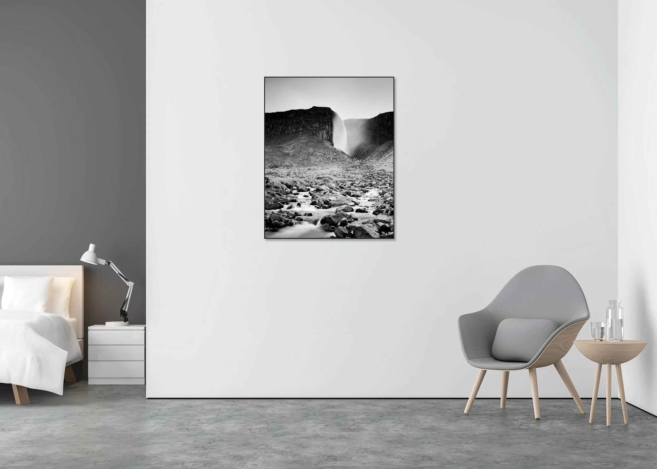 Monochrome photo print of an Icelandic waterfall between cliffs in misty spray, with a rugged boulder-strewn riverbed, mounted to Dibond in an aluminium ArtBox.