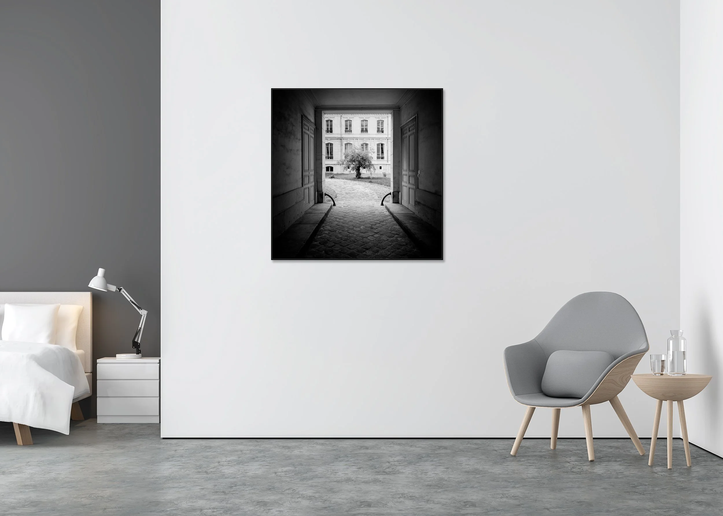 Tree in the Courtyard displayed in a modern interior, mounted on aluminium Dibond in a black ArtBox frame by Gerald Berghammer.