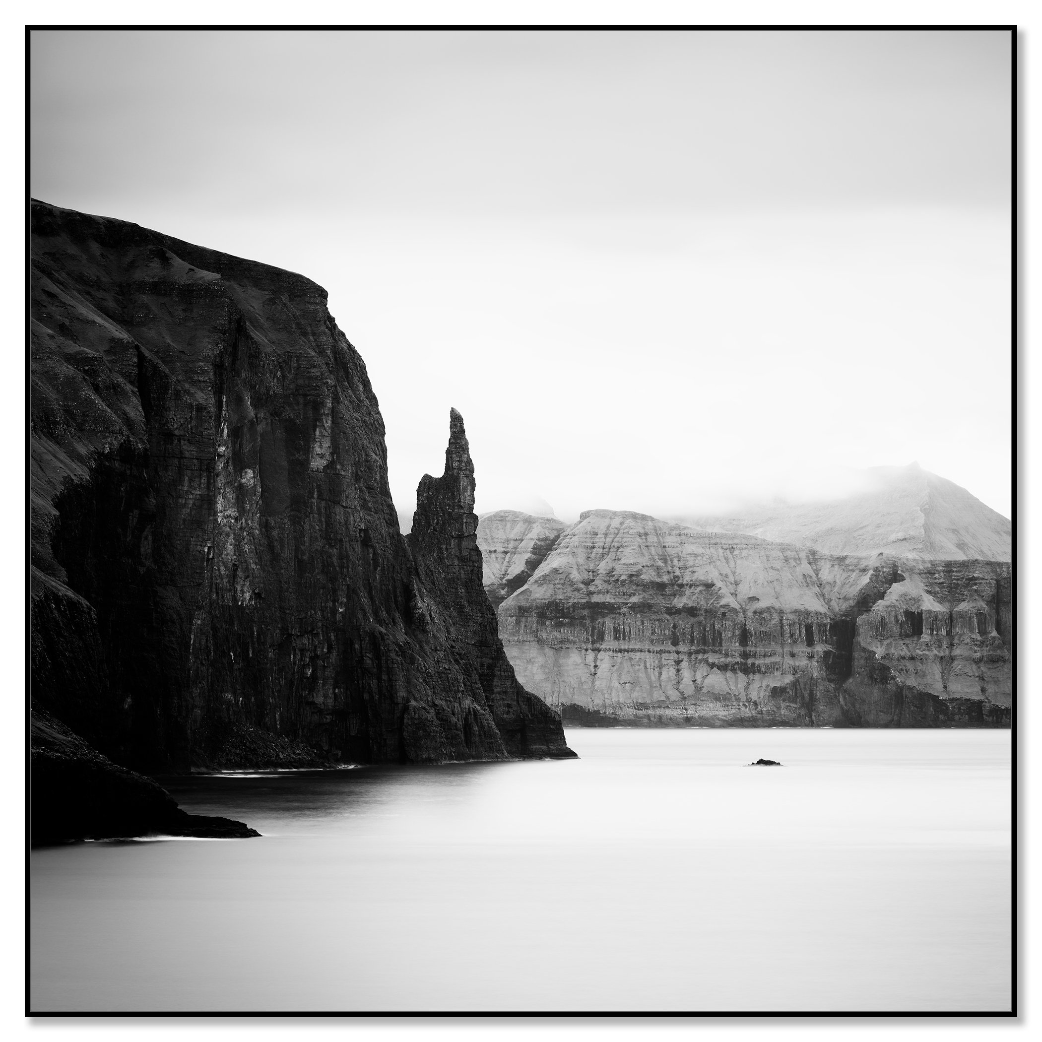 Trøllkonufingur Monolith Study 2, Faroe Islands, shown on aluminium Dibond in a black aluminium ArtBox frame by Gerald Berghammer.