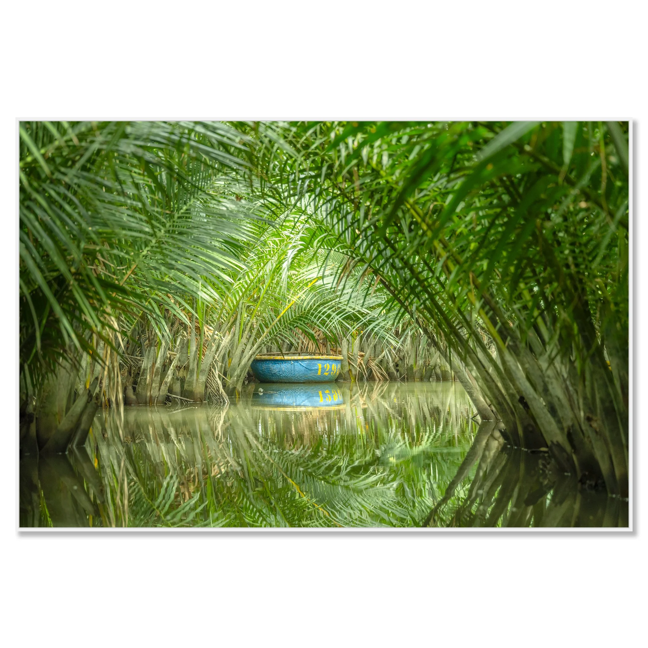 © 2025 Gerald Berghammer - Color waterscape photography. A small coconut boat among dense green nipa palm trees on a calm water body, with its reflection visible. Chromaluxe framed white