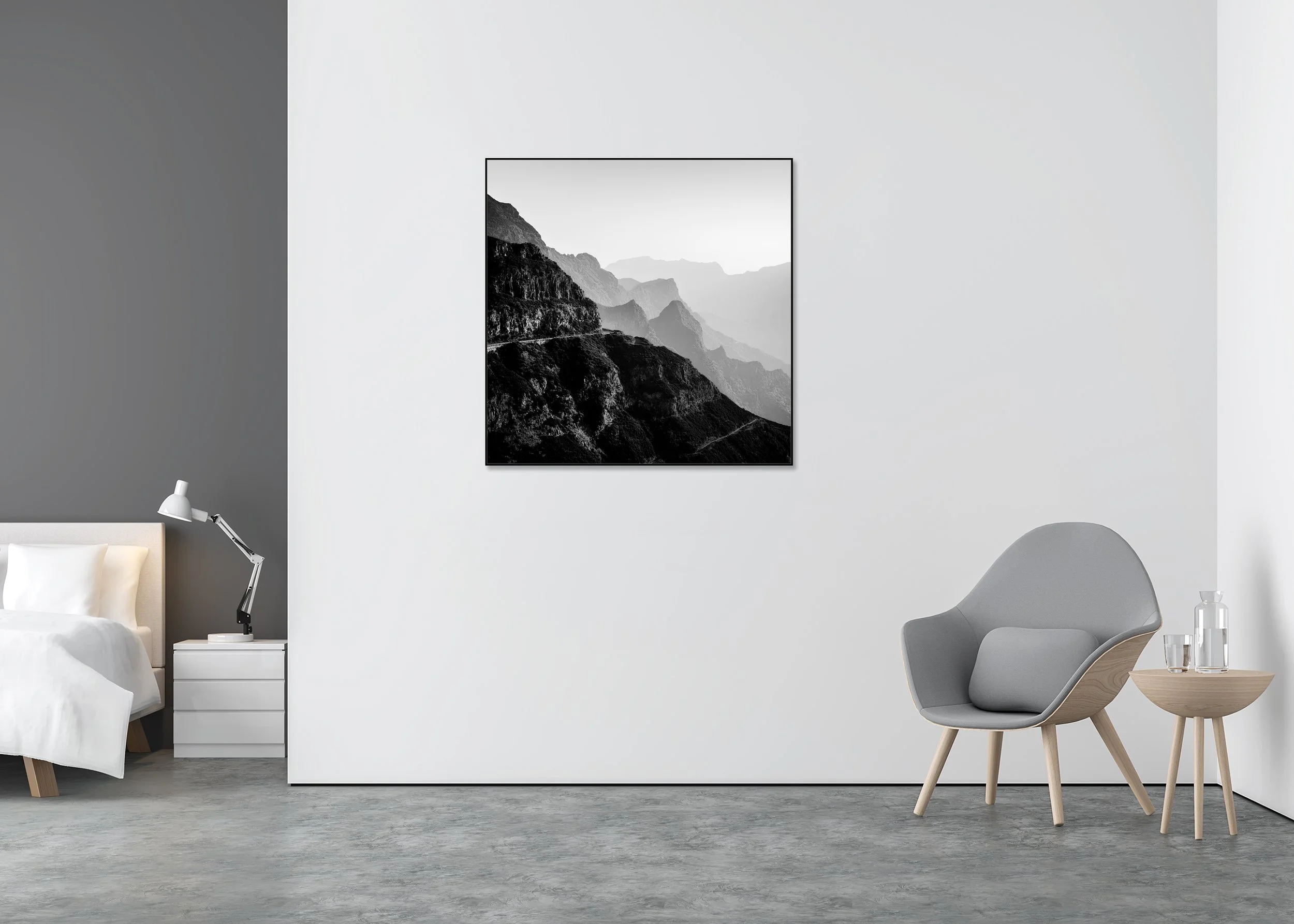 Black and white photo of dramatic mountain slopes and a curving road cutting across the terrain, presented as a ChromaLuxe metal print in an aluminium ArtBox.
