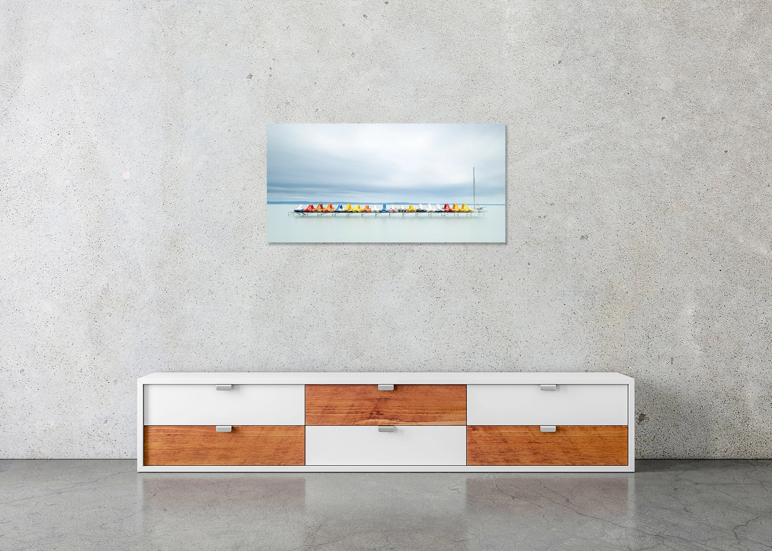 Pedal Boats and a Catamaran displayed in a modern interior as a frameless colour artwork mounted on aluminium Dibond by Gerald Berghammer.