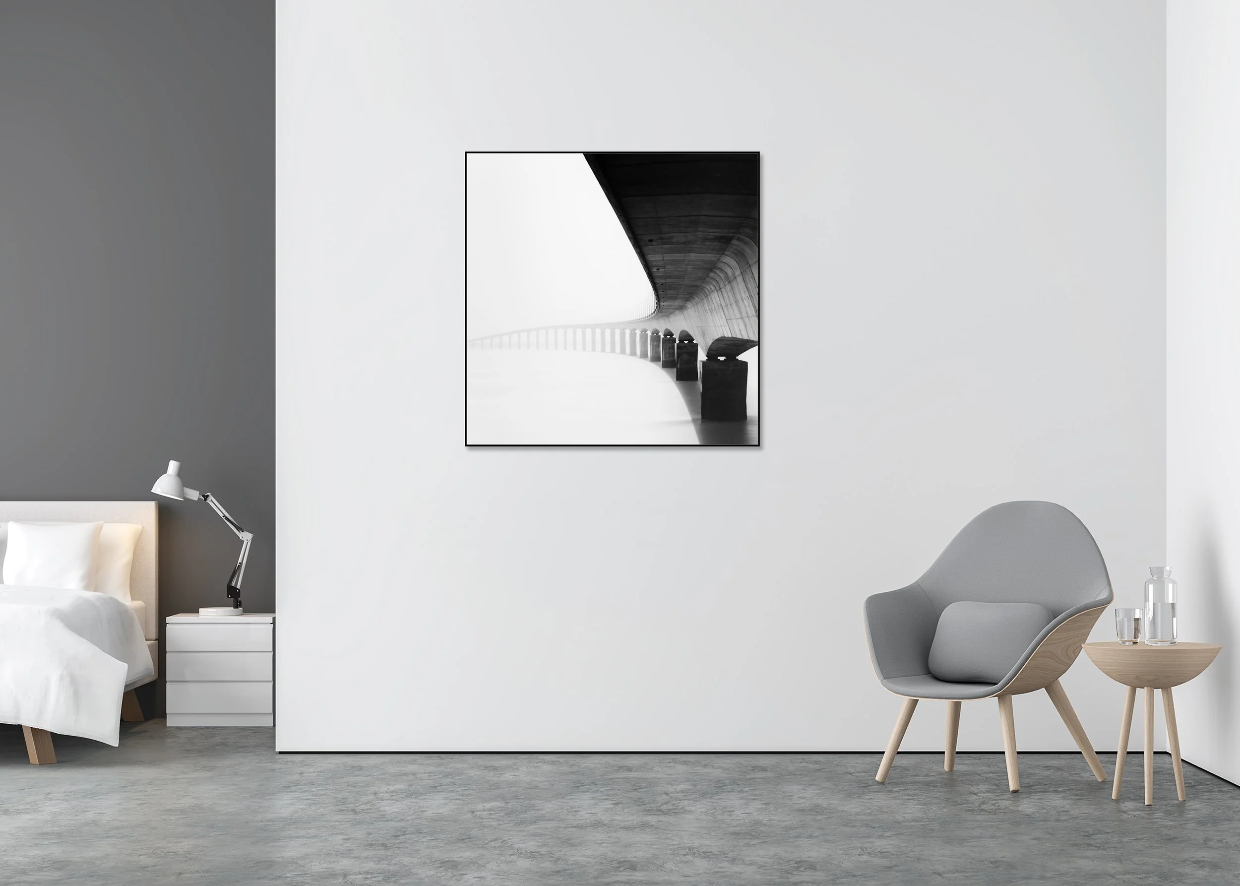 Île de Ré Bridge Study 1 displayed in a minimalist interior, mounted on aluminium Dibond in a black ArtBox frame by Gerald Berghammer.