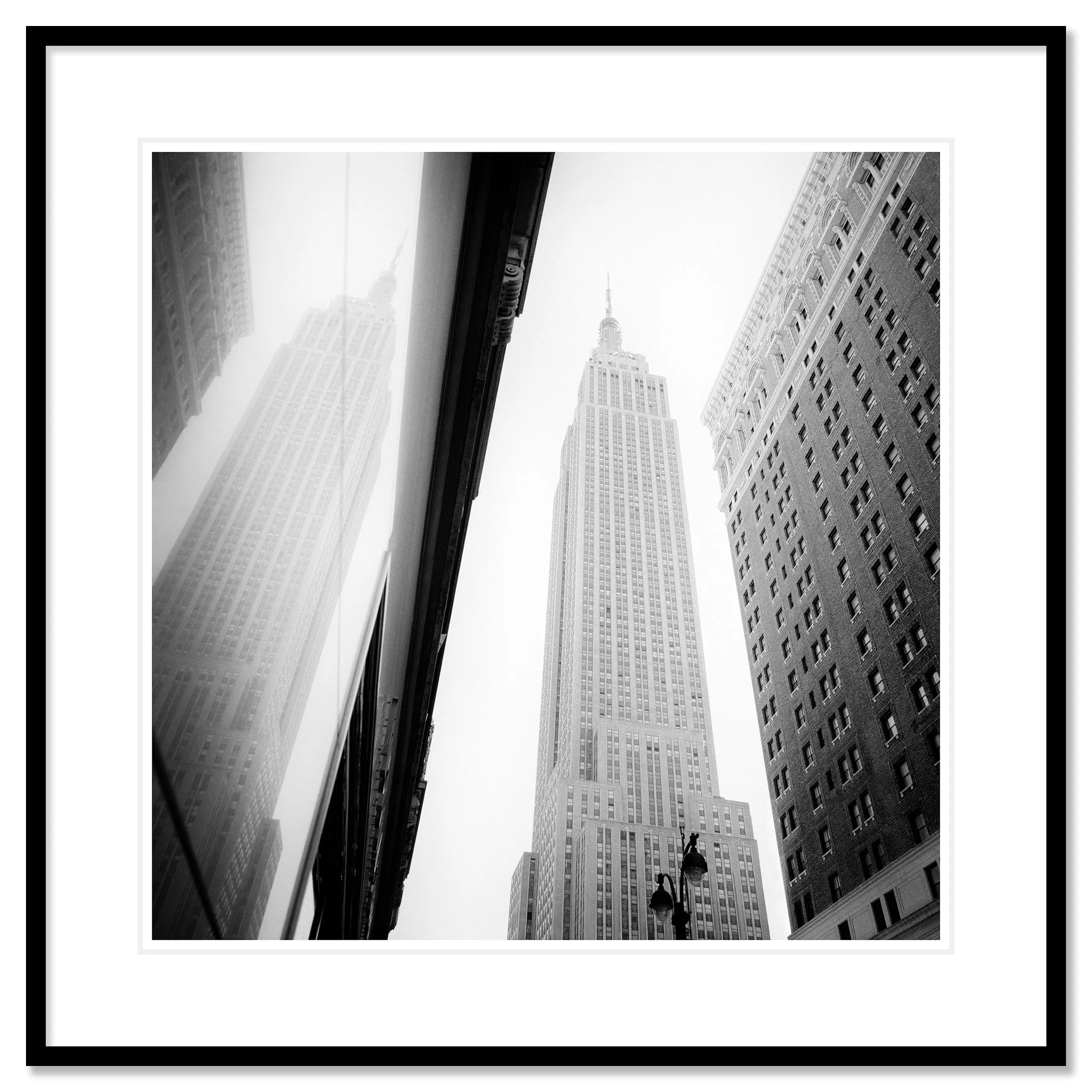 Empire State Building Study 1 by Gerald Berghammer in a black aluminium frame with a white mount.