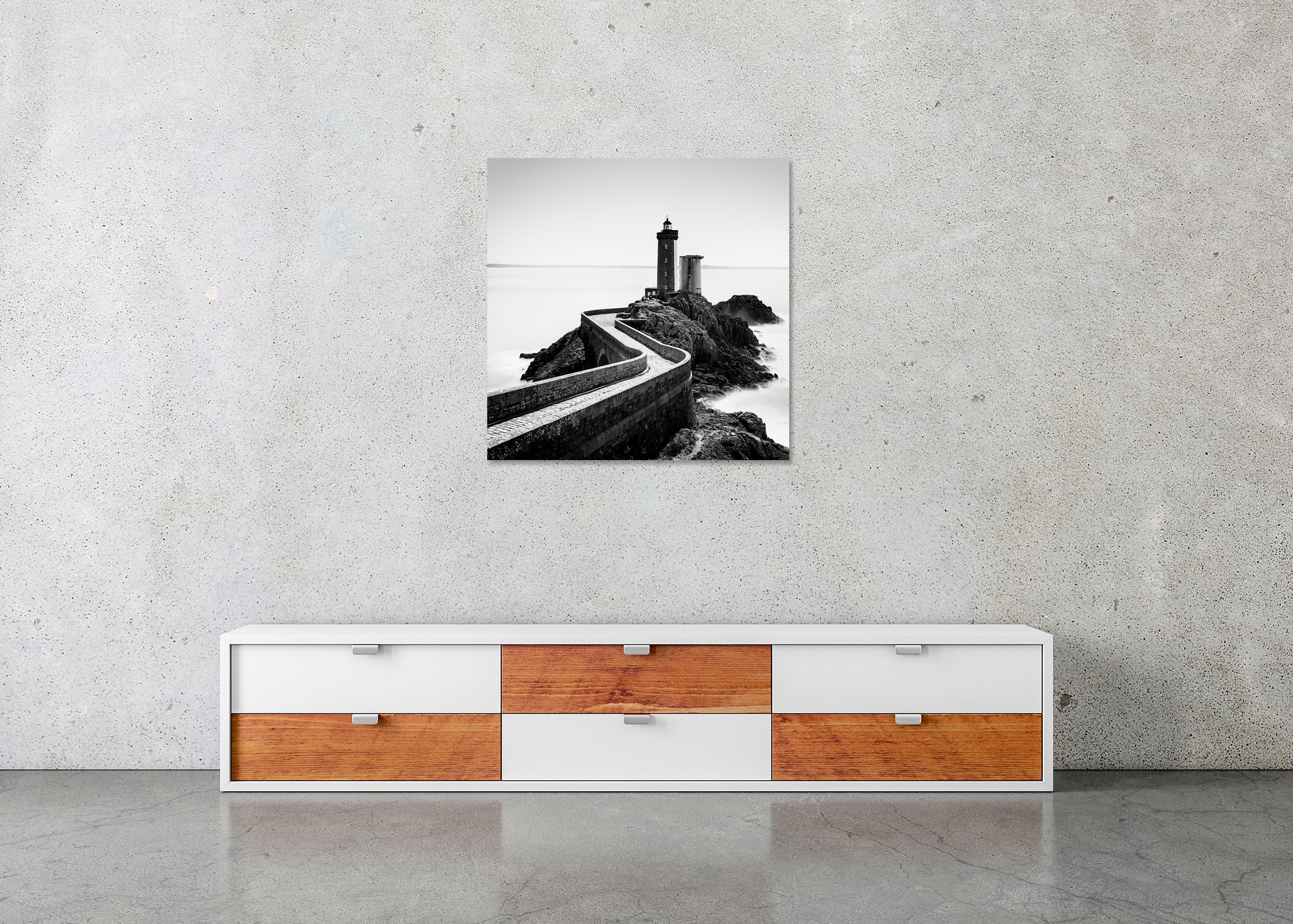 Petit Minou Lighthouse Study 1 displayed in a modern interior as a frameless black-and-white aluminium Dibond print by Gerald Berghammer.