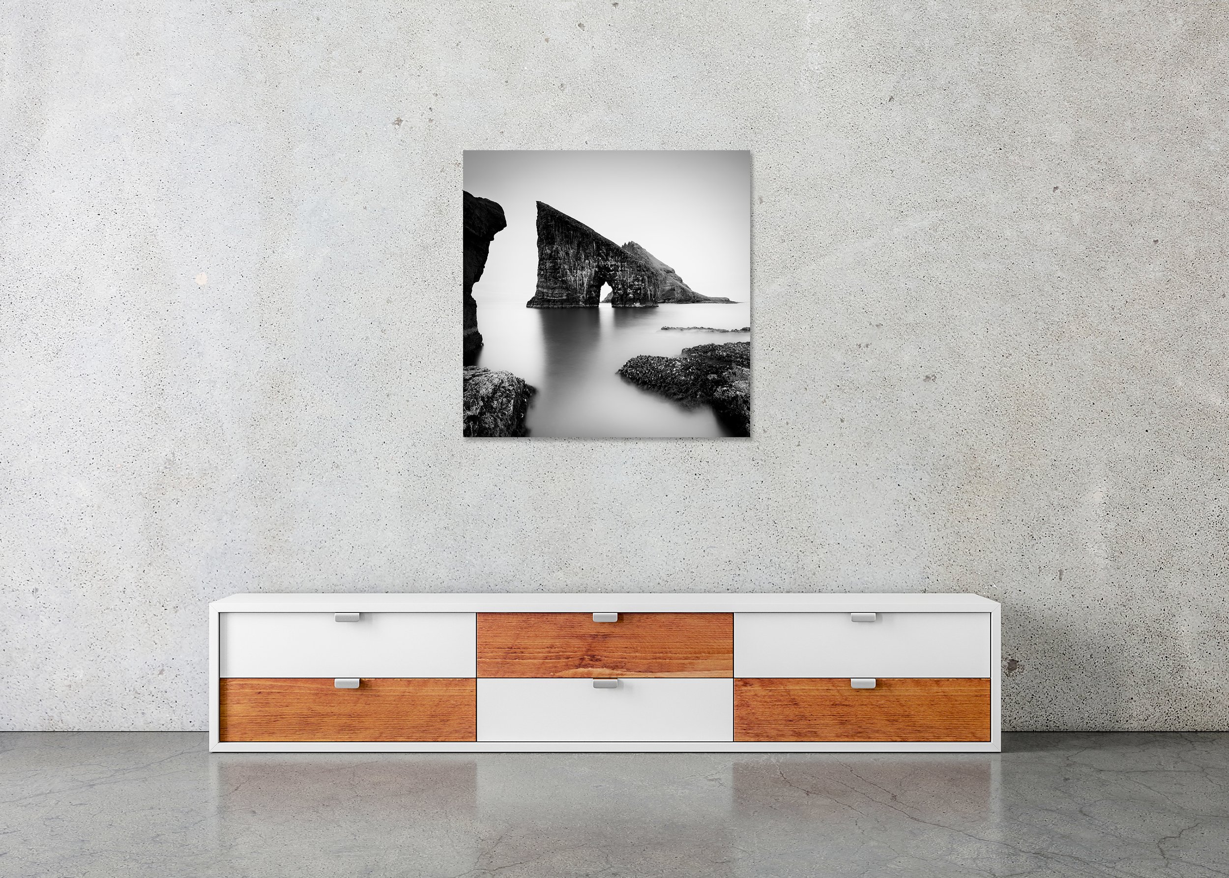 Black and white long-exposure sea arch photo print mounted to Dibond, frameless.