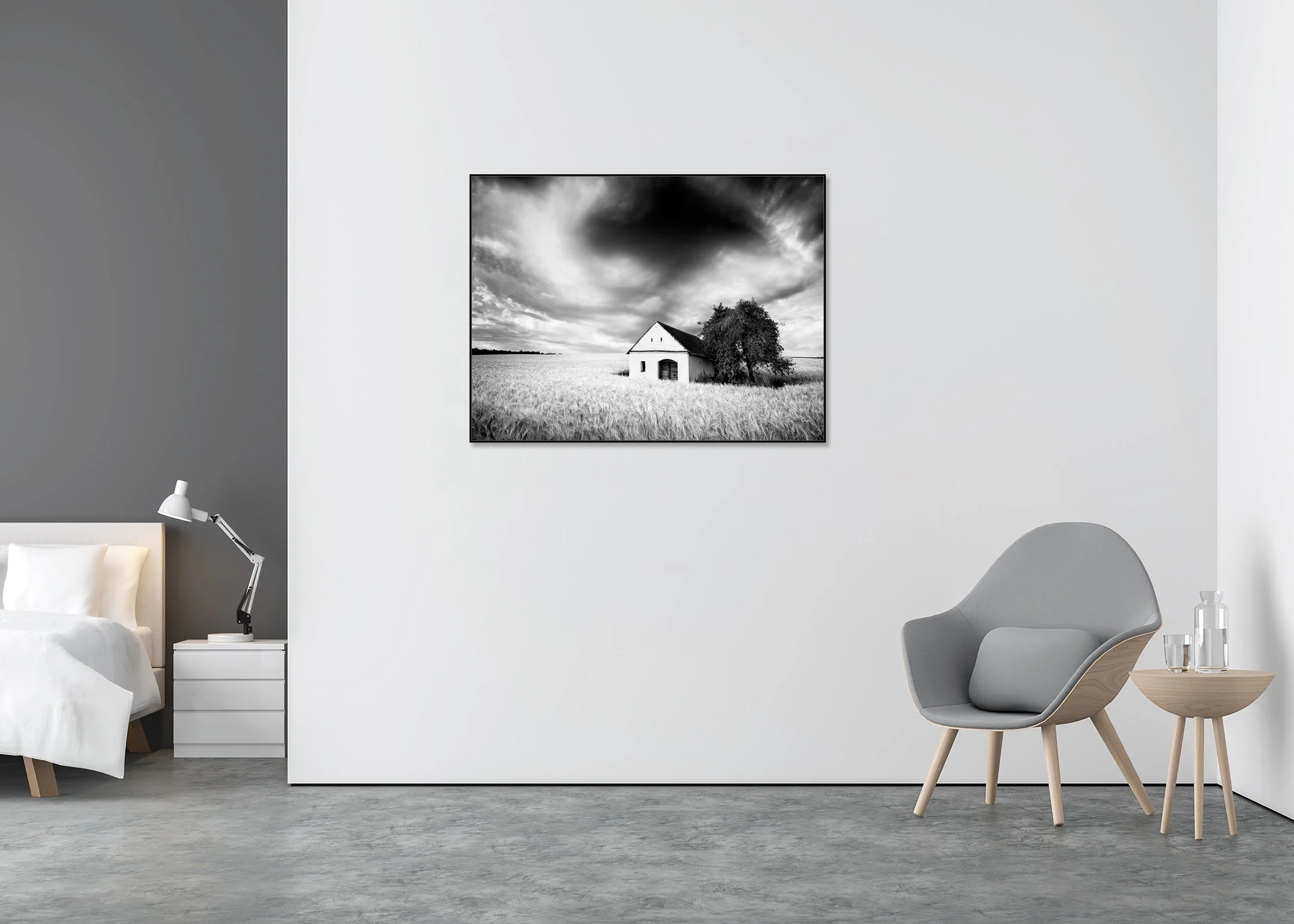 Black-and-white photo of the Wine Press House in a wheat field under dramatic storm clouds, mounted on Dibond in an aluminium ArtBox frame.