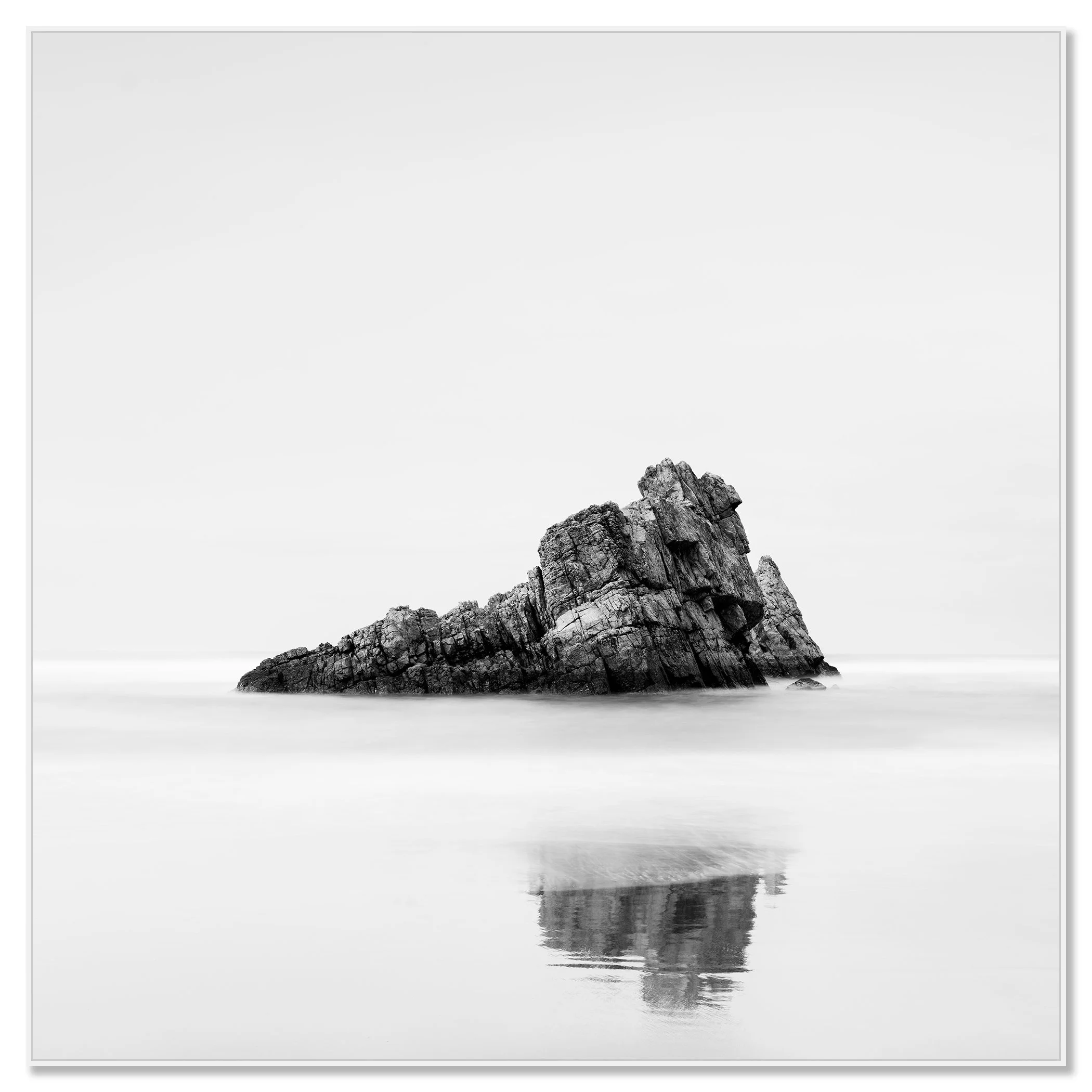 Rock on the Beach, Study 1 – black-and-white photograph mounted on aluminium Dibond in a white ArtBox frame by Gerald Berghammer.