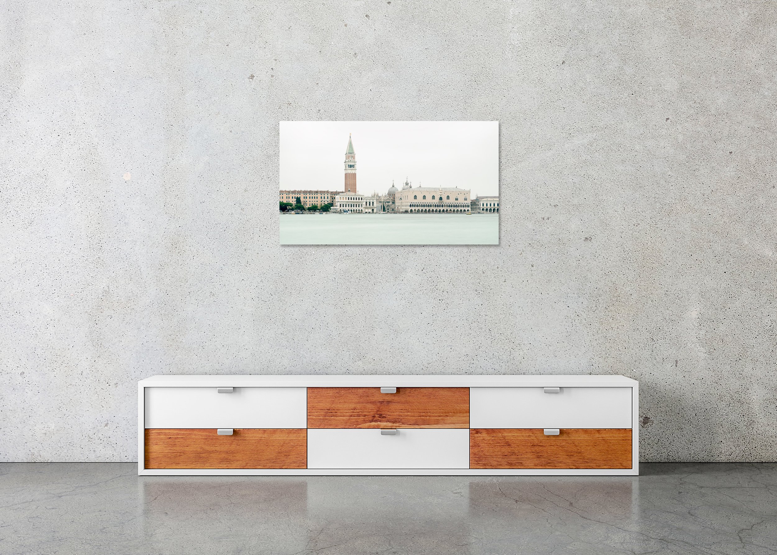 View of Venice, Panorama Study 3 – frameless colour photograph on aluminium Dibond displayed above a sideboard in a minimalist interior. Photo by Gerald Berghammer.