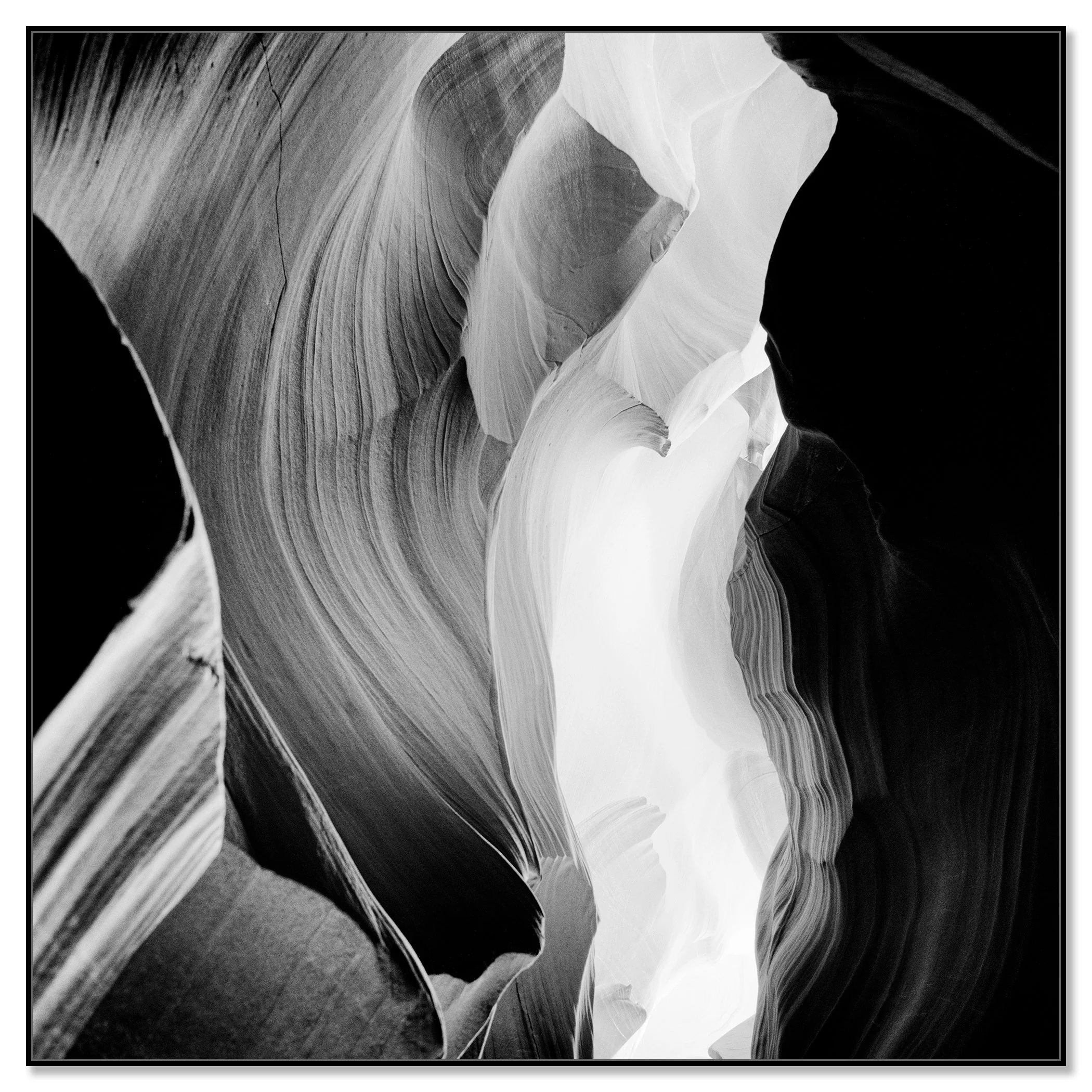 Narrow sandstone slot canyon with sculpted, wave-like rock walls, Arizona, USA – framed ArtBox black
